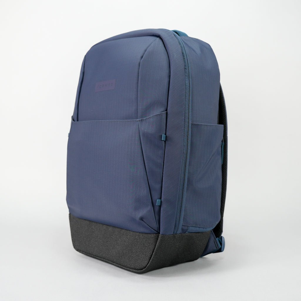 Blue and gray backpack on a white background