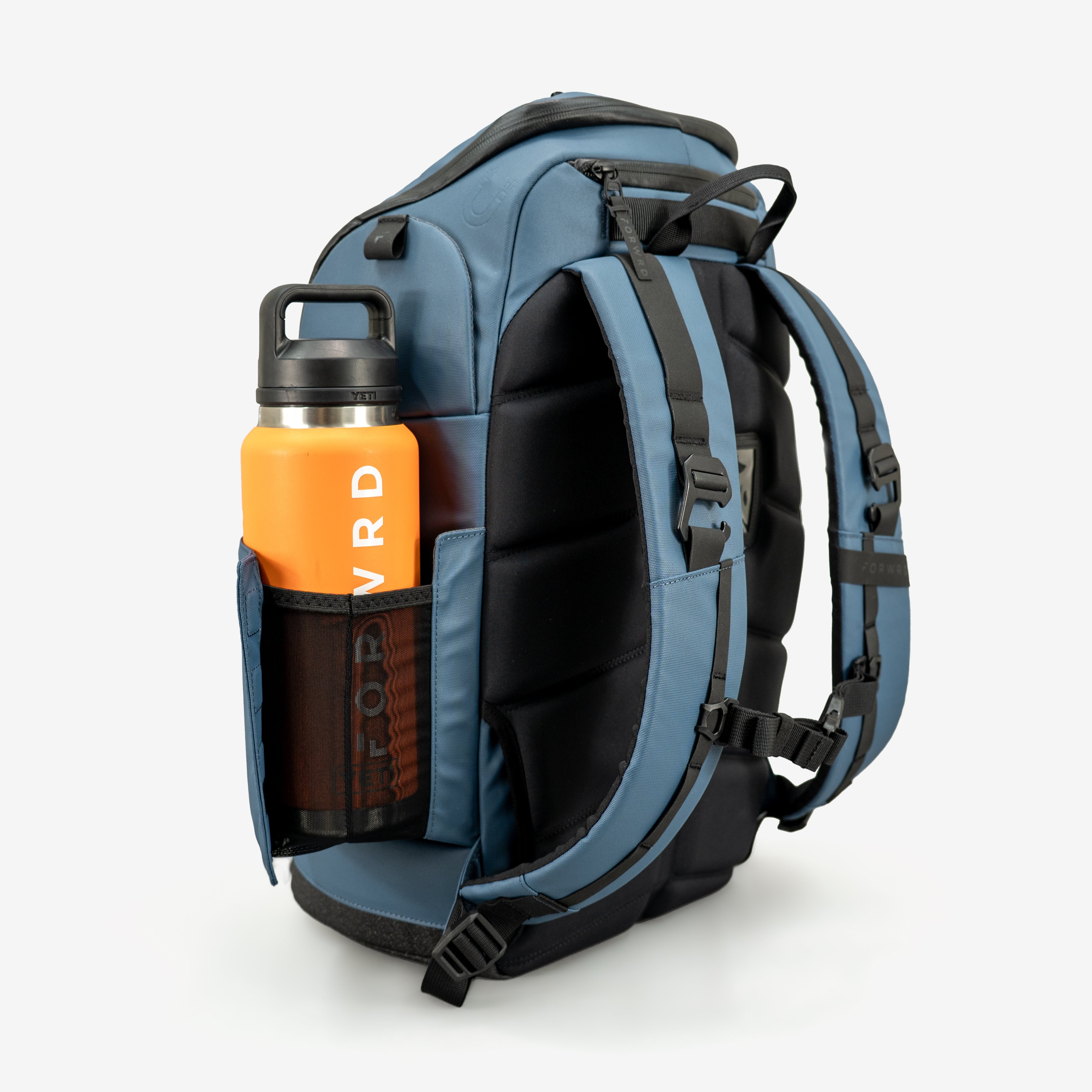 Blue backpack with an orange water bottle in a pocket on a white background