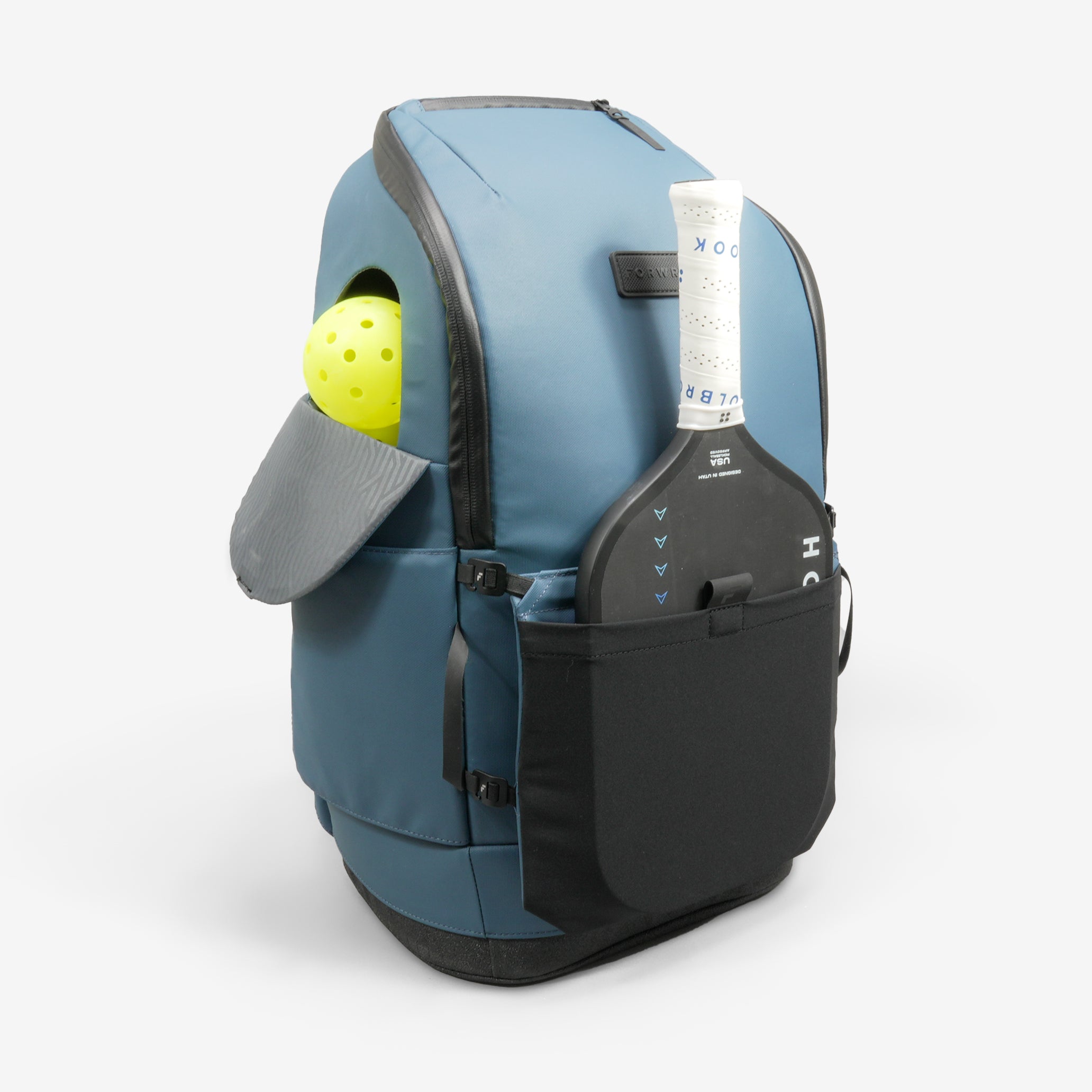 Blue backpack with a tennis ball and racket on a white background