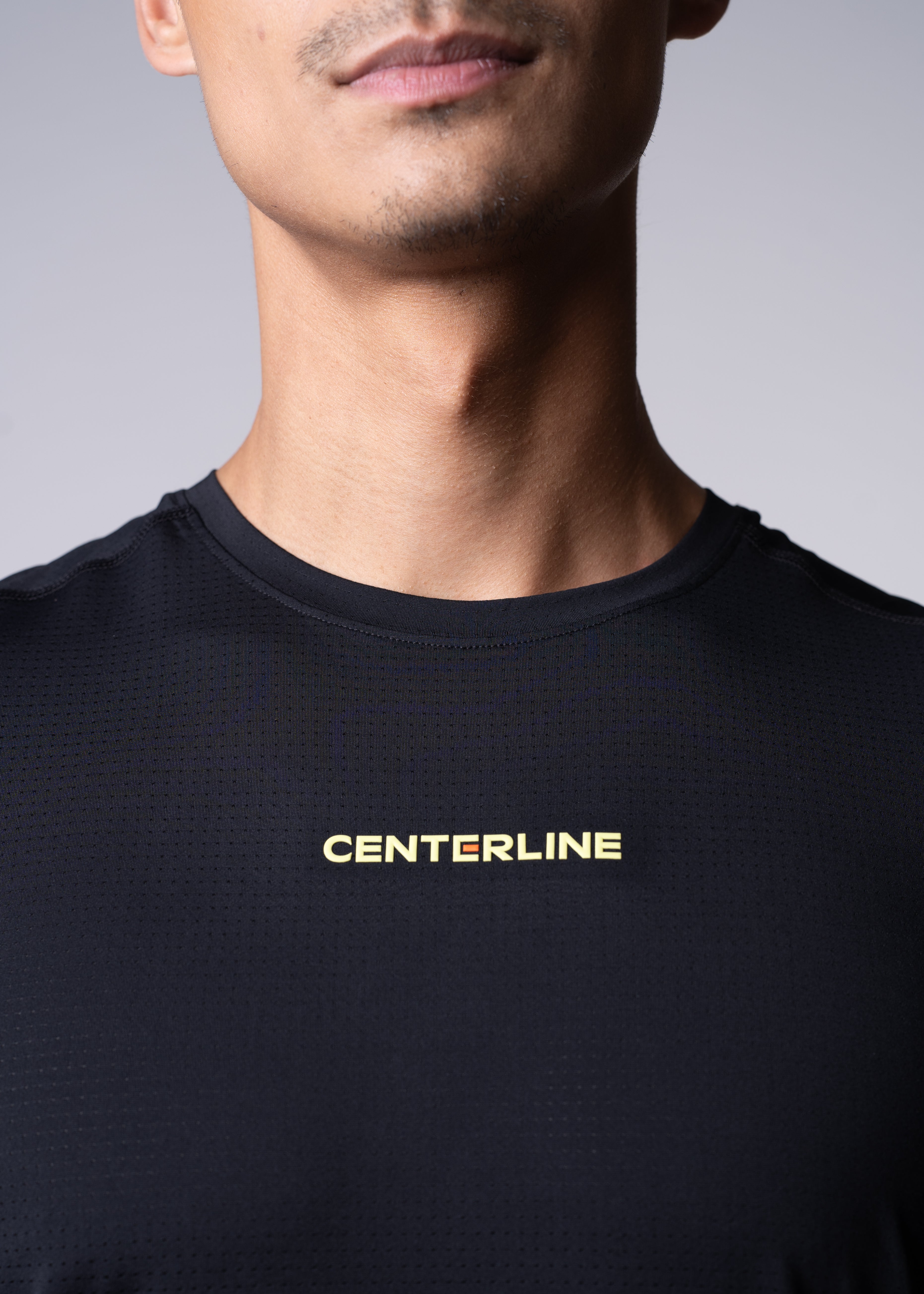 AirLite Men's Long Sleeve - FORWRD - Introducing the AirLite Men's Long Sleeve top, engineered with innovative GripTek™ textured knit on the sleeve cuffs. This top doubles as a convenient towel for quick perspiration management during matches. Experience next-level performance and functionality with this essential piece, ensuring you stay focused and comfortable on the court. Elevate your game with every serve, volley, and smash in this game-changing top.