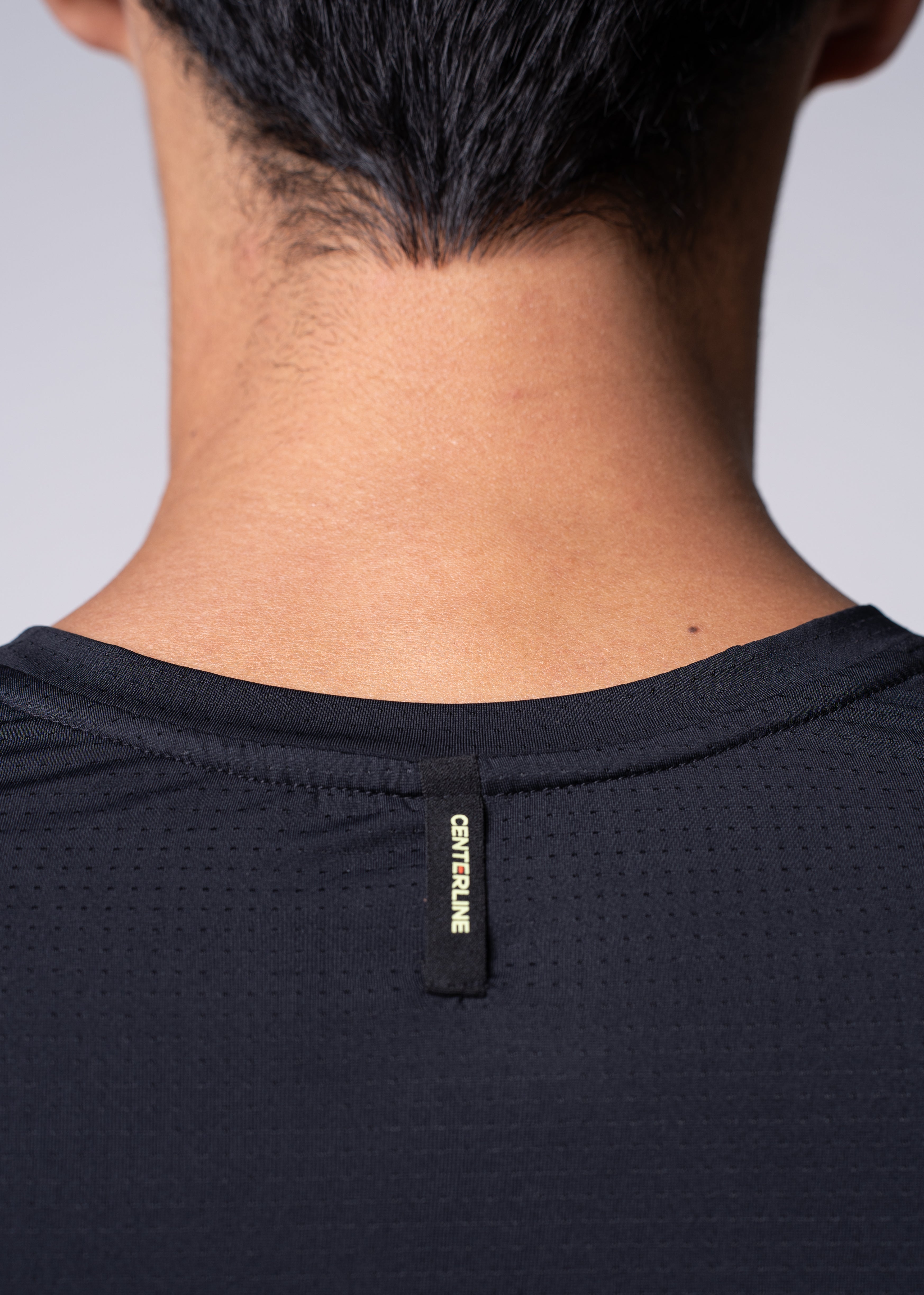 AirLite Men's Long Sleeve - FORWRD - Introducing the AirLite Men's Long Sleeve top, engineered with innovative GripTek™ textured knit on the sleeve cuffs. This top doubles as a convenient towel for quick perspiration management during matches. Experience next-level performance and functionality with this essential piece, ensuring you stay focused and comfortable on the court. Elevate your game with every serve, volley, and smash in this game-changing top.