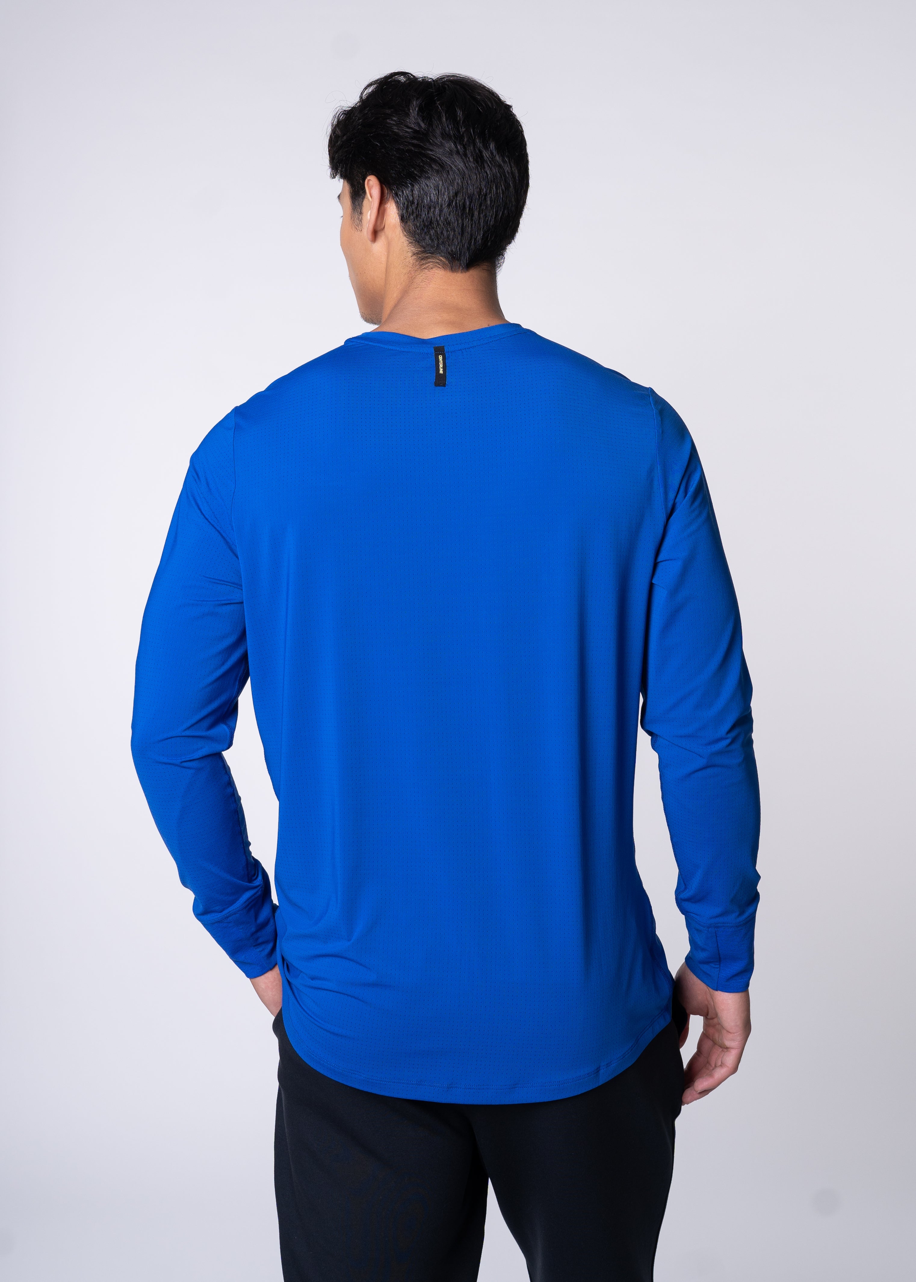 AirLite Men's Long Sleeve - FORWRD - Introducing the AirLite Men's Long Sleeve top, engineered with innovative GripTek™ textured knit on the sleeve cuffs. This top doubles as a convenient towel for quick perspiration management during matches. Experience next-level performance and functionality with this essential piece, ensuring you stay focused and comfortable on the court. Elevate your game with every serve, volley, and smash in this game-changing top.