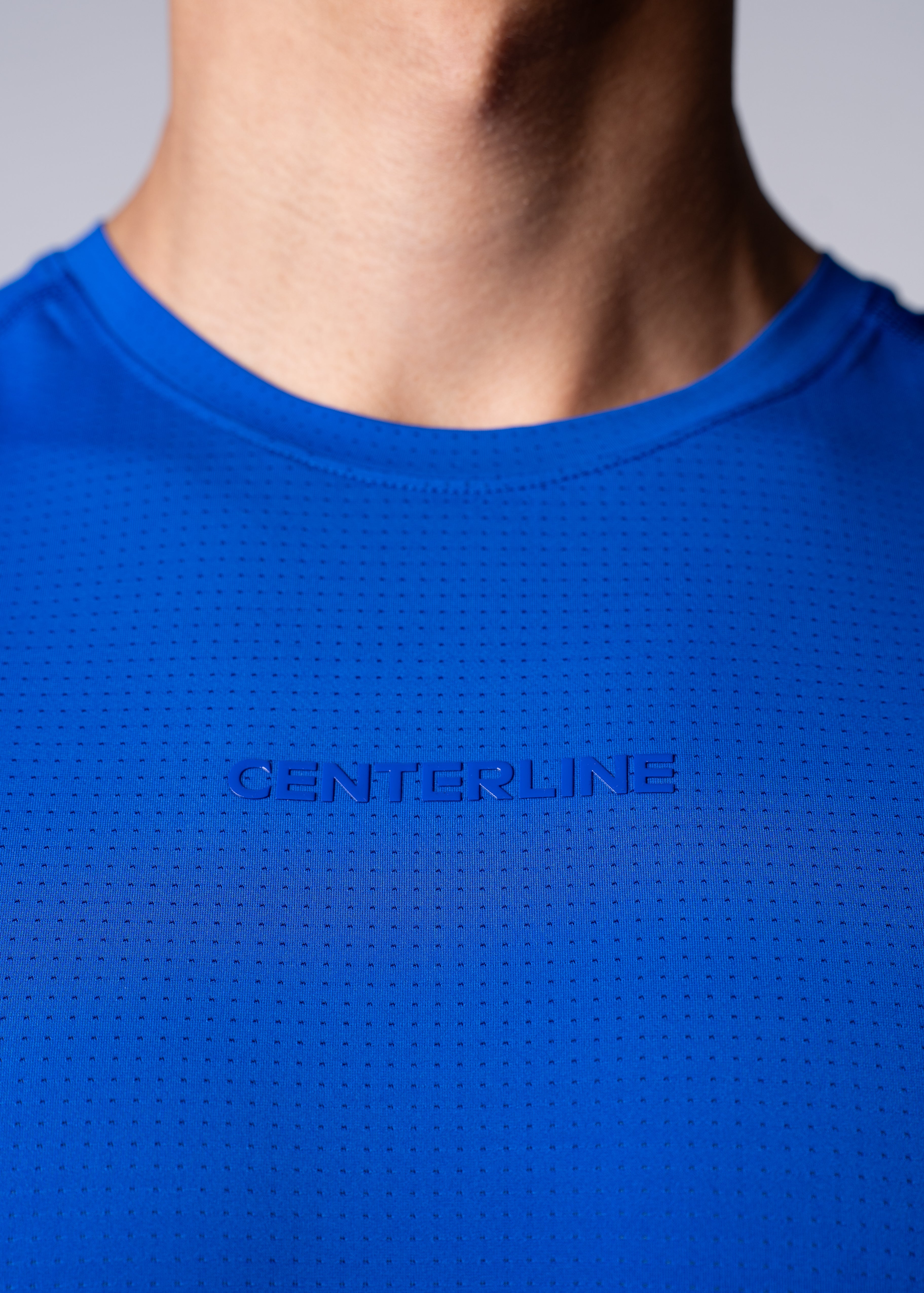 AirLite Men's Long Sleeve - FORWRD - Introducing the AirLite Men's Long Sleeve top, engineered with innovative GripTek™ textured knit on the sleeve cuffs. This top doubles as a convenient towel for quick perspiration management during matches. Experience next-level performance and functionality with this essential piece, ensuring you stay focused and comfortable on the court. Elevate your game with every serve, volley, and smash in this game-changing top.