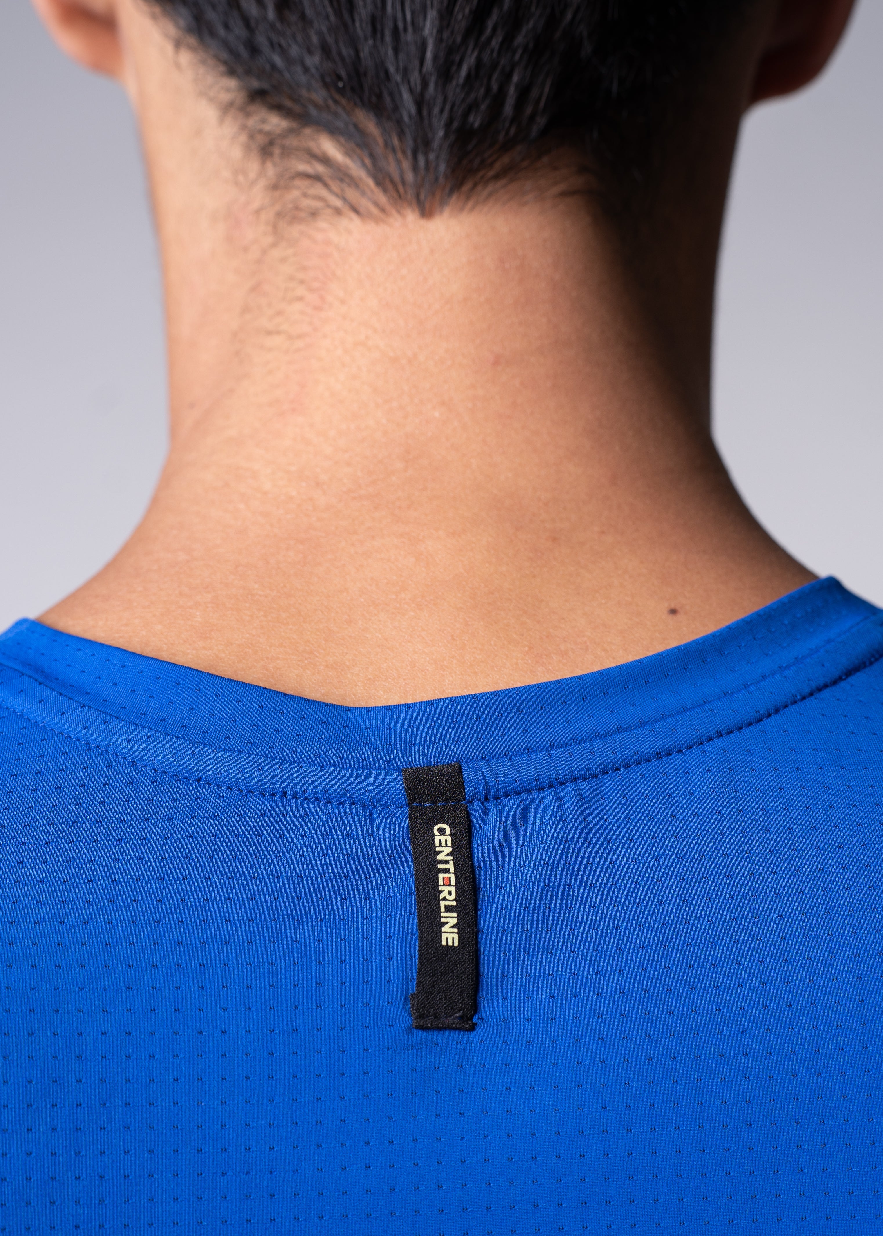 AirLite Men's Long Sleeve - FORWRD - Introducing the AirLite Men's Long Sleeve top, engineered with innovative GripTek™ textured knit on the sleeve cuffs. This top doubles as a convenient towel for quick perspiration management during matches. Experience next-level performance and functionality with this essential piece, ensuring you stay focused and comfortable on the court. Elevate your game with every serve, volley, and smash in this game-changing top.