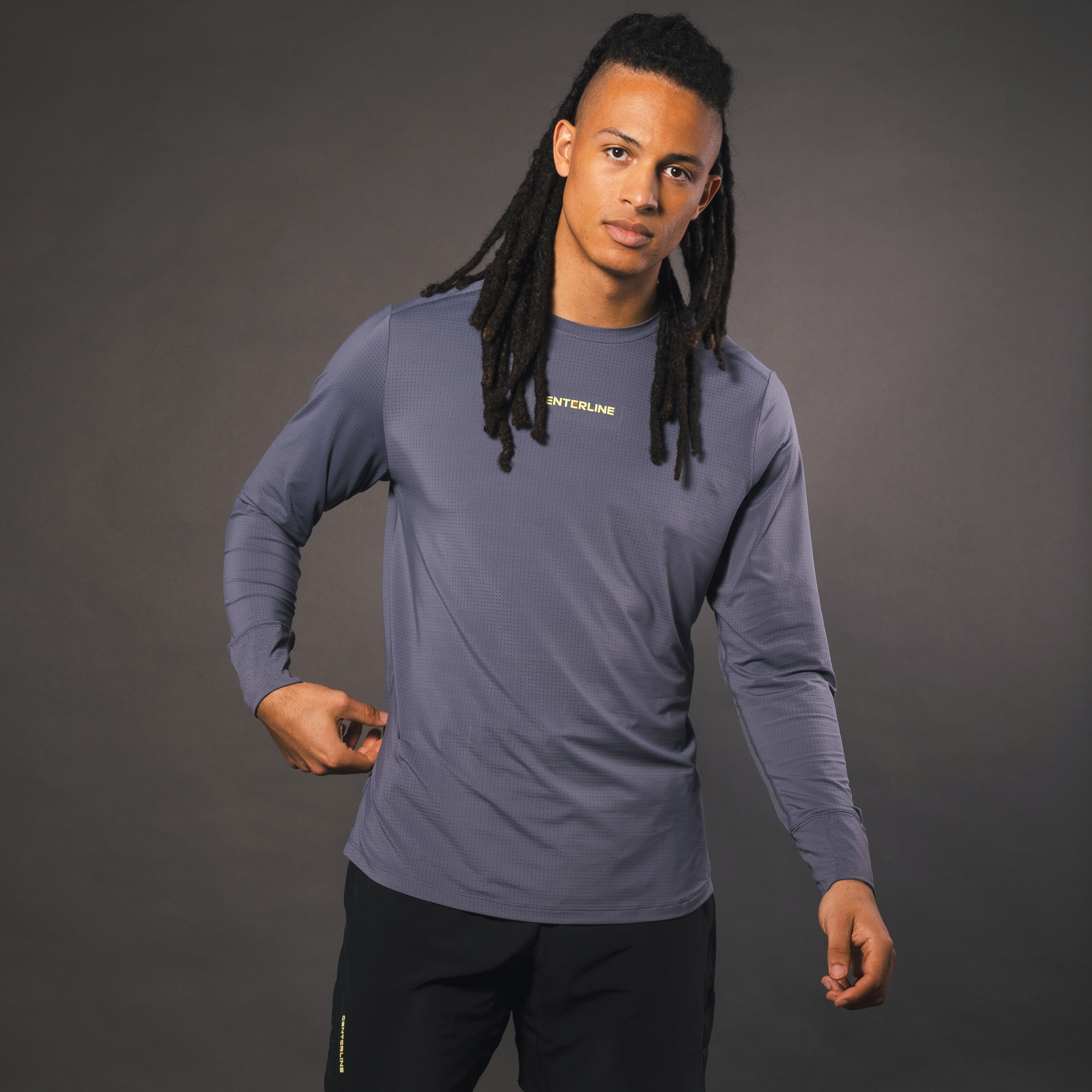 AirLite Men's Long Sleeve - FORWRD - Introducing the AirLite Men's Long Sleeve top, engineered with innovative GripTek™ textured knit on the sleeve cuffs. This top doubles as a convenient towel for quick perspiration management during matches. Experience next-level performance and functionality with this essential piece, ensuring you stay focused and comfortable on the court. Elevate your game with every serve, volley, and smash in this game-changing top.