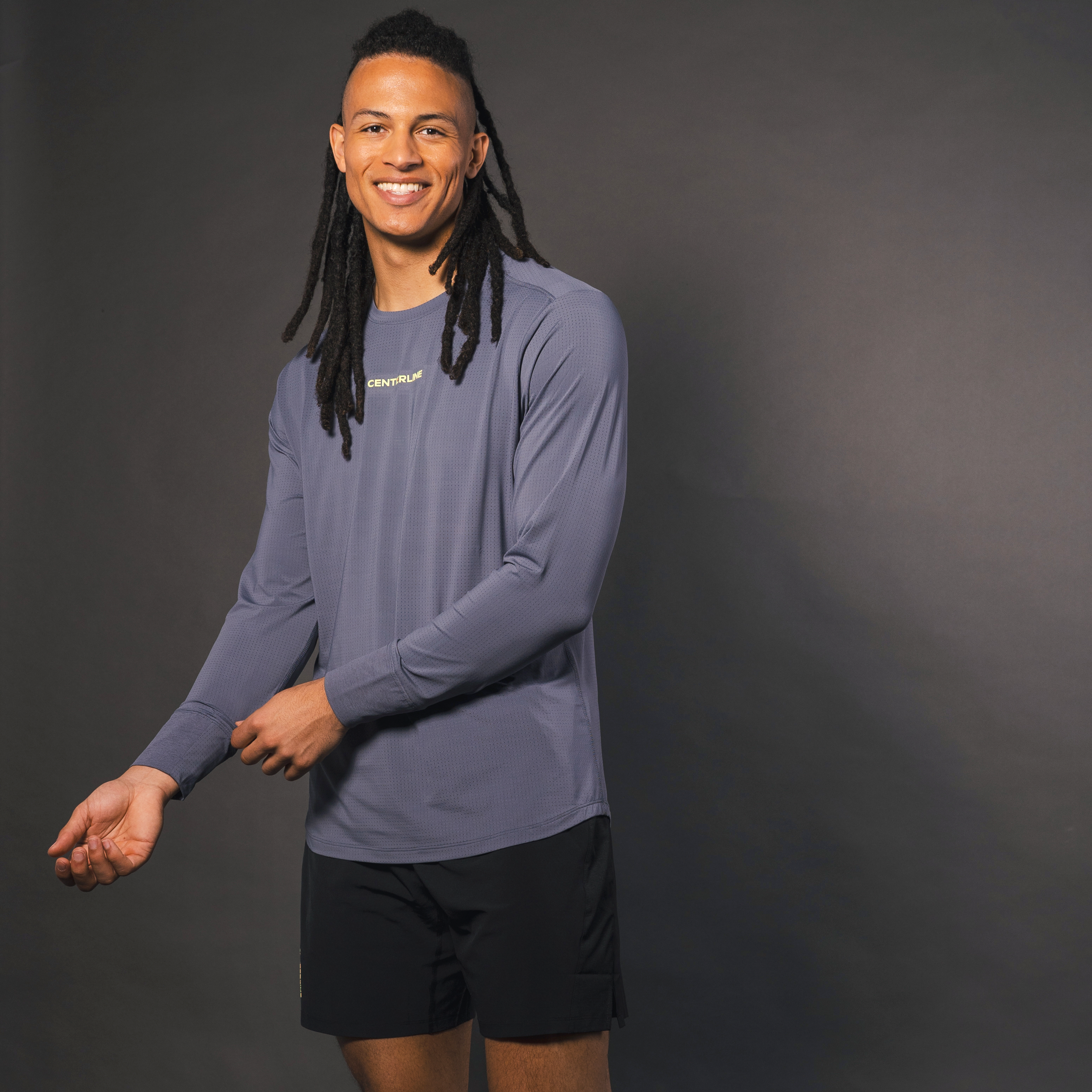 AirLite Men's Long Sleeve - FORWRD - Introducing the AirLite Men's Long Sleeve top, engineered with innovative GripTek™ textured knit on the sleeve cuffs. This top doubles as a convenient towel for quick perspiration management during matches. Experience next-level performance and functionality with this essential piece, ensuring you stay focused and comfortable on the court. Elevate your game with every serve, volley, and smash in this game-changing top.
