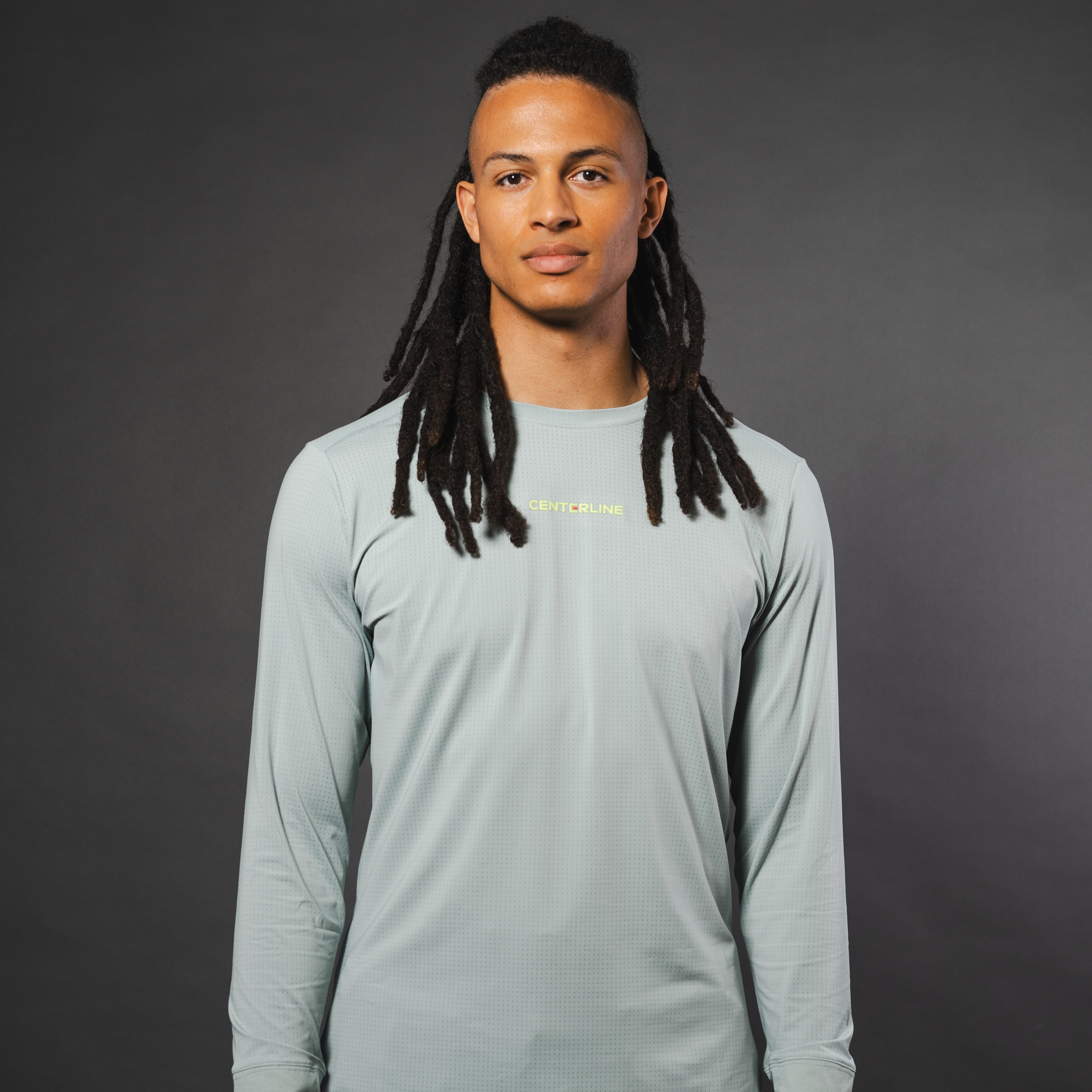 AirLite Men's Long Sleeve - FORWRD - Introducing the AirLite Men's Long Sleeve top, engineered with innovative GripTek™ textured knit on the sleeve cuffs. This top doubles as a convenient towel for quick perspiration management during matches. Experience next-level performance and functionality with this essential piece, ensuring you stay focused and comfortable on the court. Elevate your game with every serve, volley, and smash in this game-changing top.