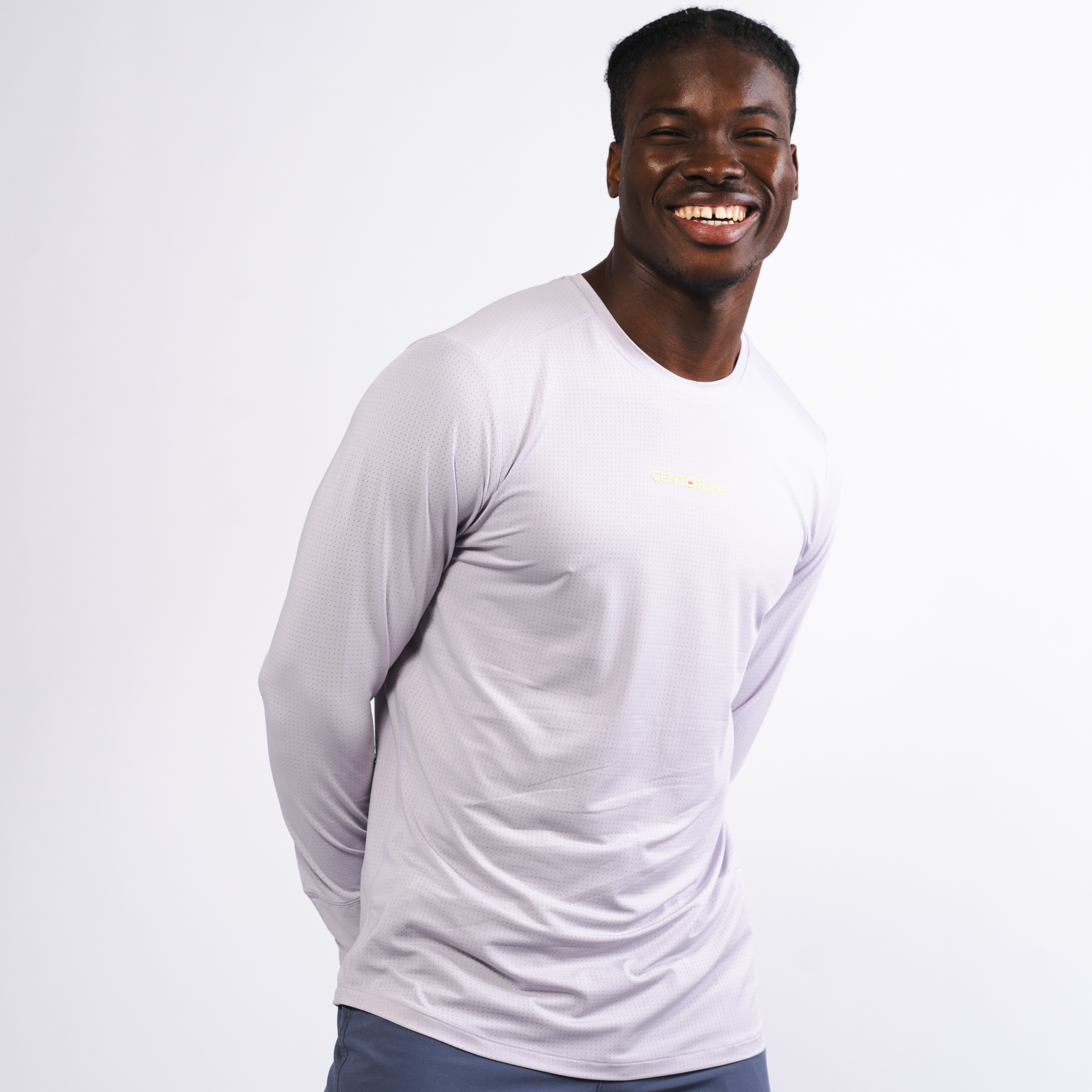AirLite Men's Long Sleeve - FORWRD - Introducing the AirLite Men's Long Sleeve top, engineered with innovative GripTek™ textured knit on the sleeve cuffs. This top doubles as a convenient towel for quick perspiration management during matches. Experience next-level performance and functionality with this essential piece, ensuring you stay focused and comfortable on the court. Elevate your game with every serve, volley, and smash in this game-changing top.