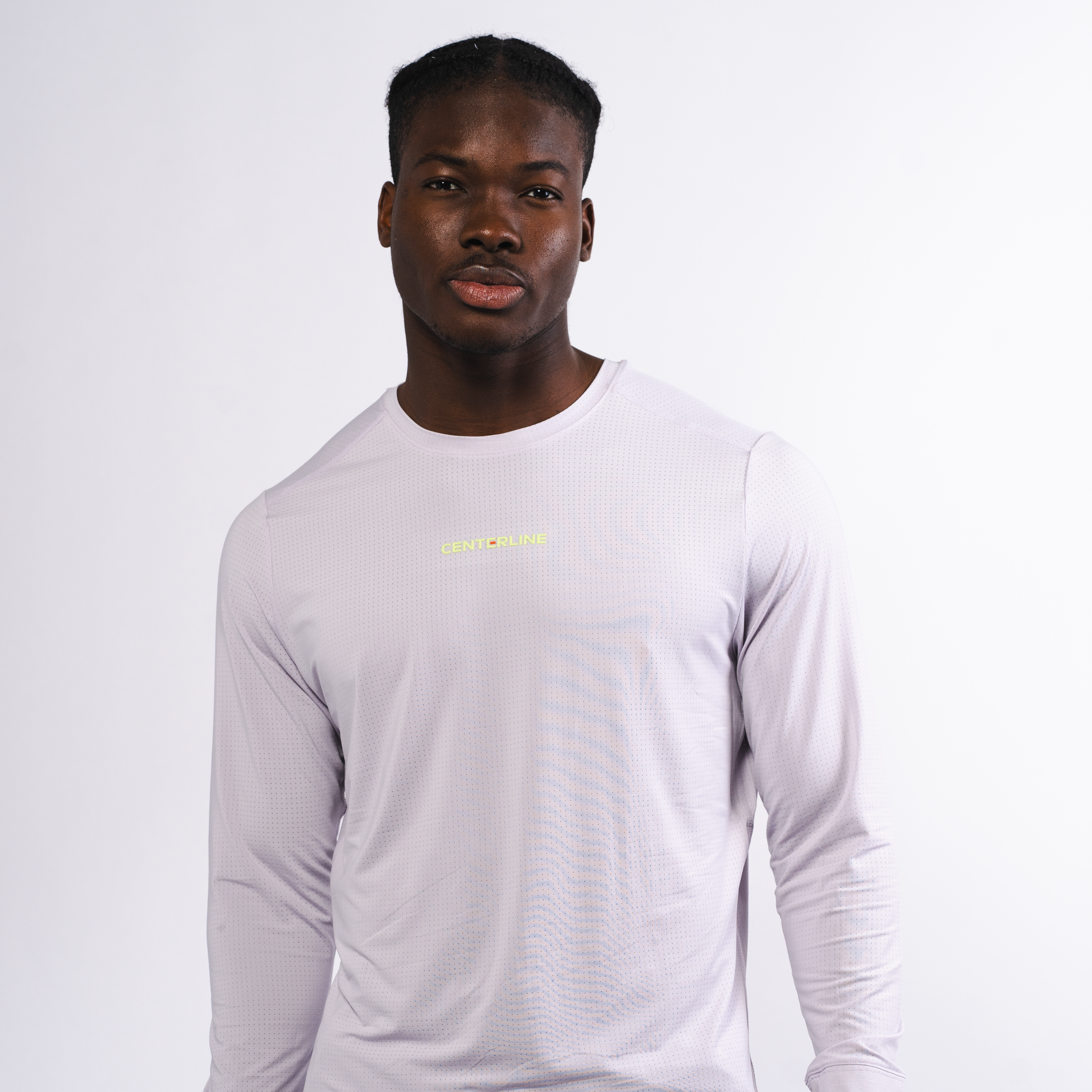 AirLite Men's Long Sleeve - FORWRD - Introducing the AirLite Men's Long Sleeve top, engineered with innovative GripTek™ textured knit on the sleeve cuffs. This top doubles as a convenient towel for quick perspiration management during matches. Experience next-level performance and functionality with this essential piece, ensuring you stay focused and comfortable on the court. Elevate your game with every serve, volley, and smash in this game-changing top.