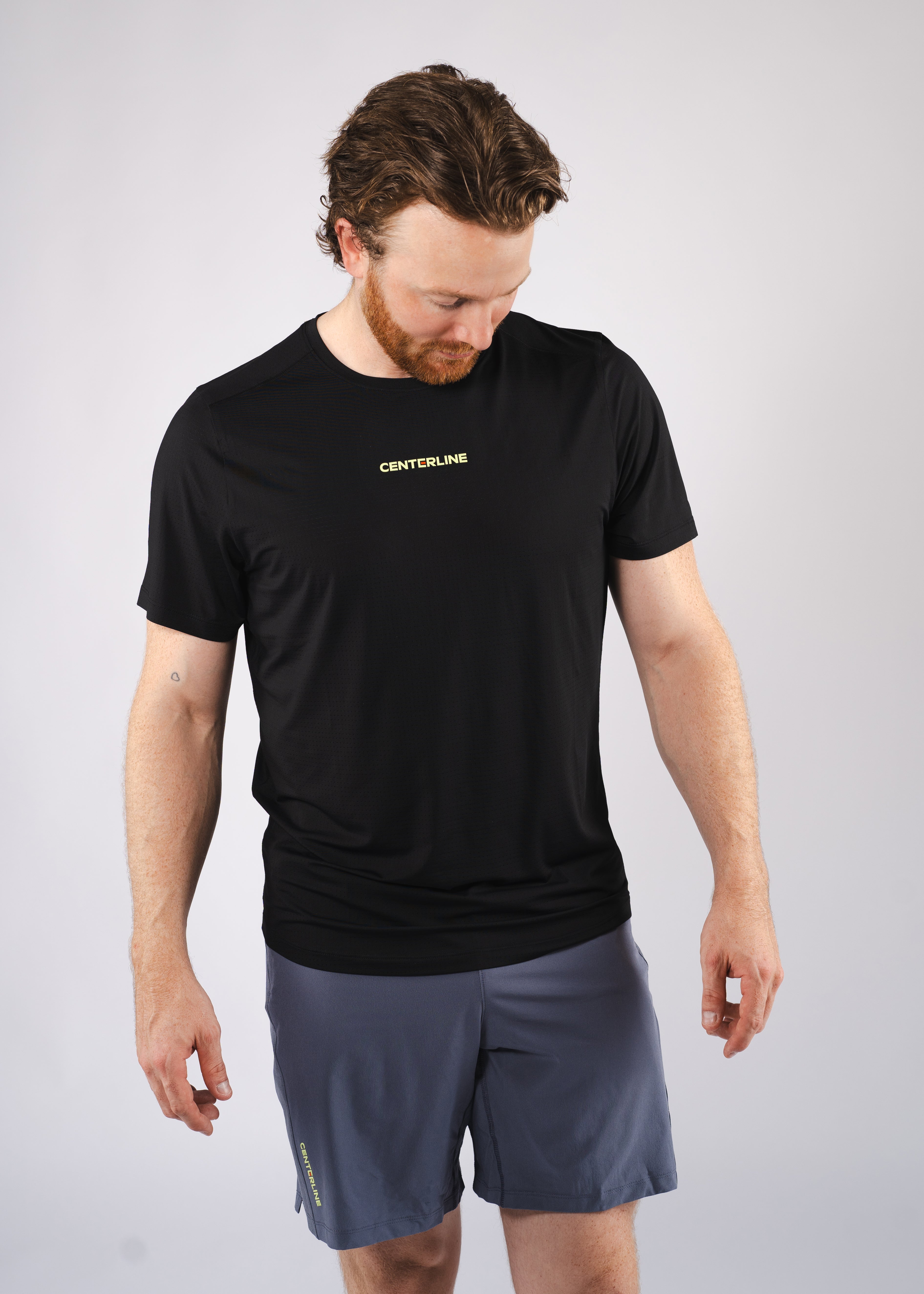 AirLite Men's Tee - FORWRD - Elevate your game with the AirLite Men's Tee, engineered from ultra-breathable mesh fabric for unmatched ventilation during pickleball play. Curved hem ensures confidence in every move, allowing you to showcase your agility without compromising on comfort. Experience the perfect blend of style and performance with this essential addition to your wardrobe.