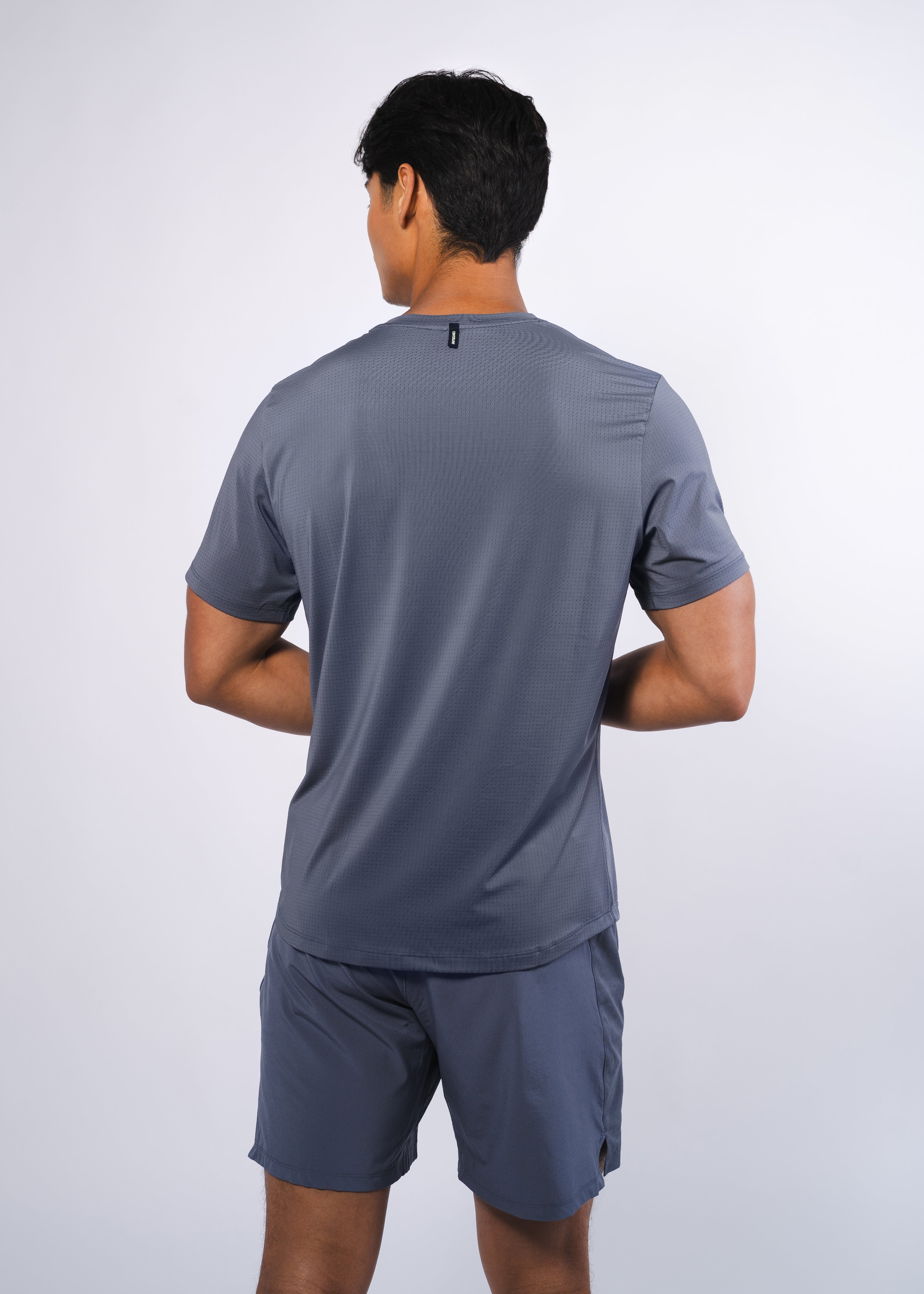 AirLite Men's Tee - FORWRD - Elevate your game with the AirLite Men's Tee, engineered from ultra-breathable mesh fabric for unmatched ventilation during pickleball play. Curved hem ensures confidence in every move, allowing you to showcase your agility without compromising on comfort. Experience the perfect blend of style and performance with this essential addition to your wardrobe.