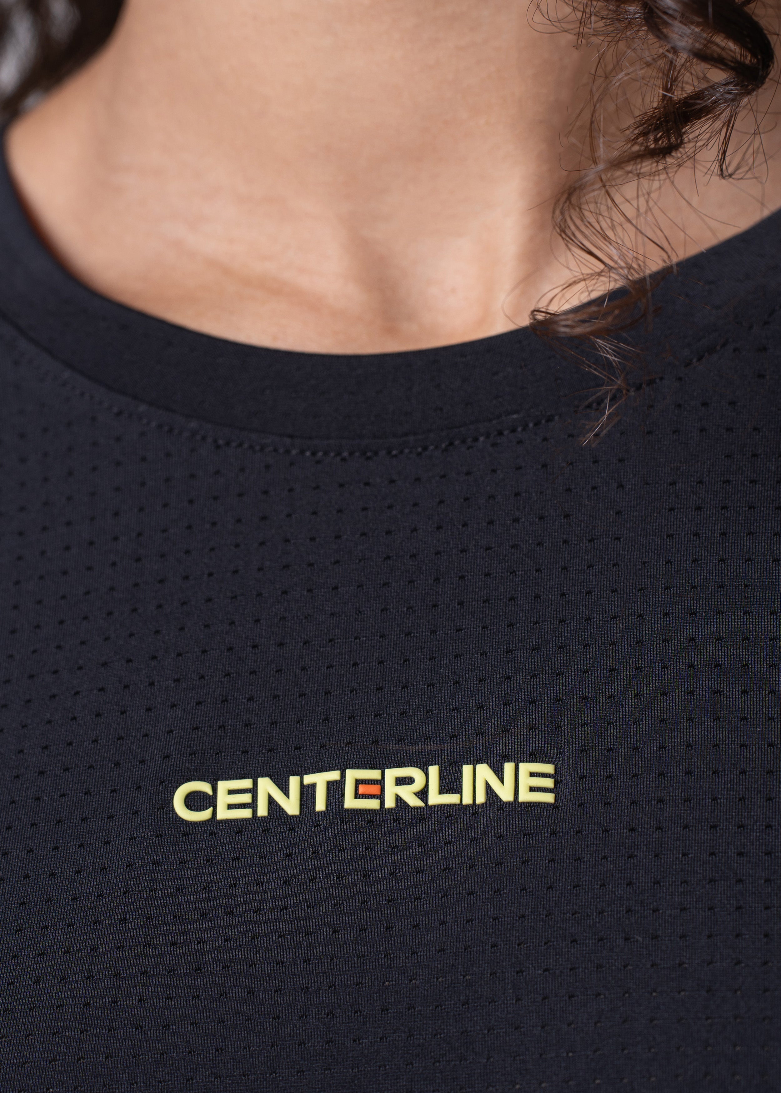 AirLite Women's Long Sleeve - FORWRD - Introducing the AirLite Women's Long Sleeve top, engineered with innovative GripTek™ textured knit on the sleeve cuffs. This top doubles as a convenient towel for quick perspiration management during matches. Experience next-level performance and functionality with this essential piece, ensuring you stay focused and comfortable on the court. Elevate your game with every serve, volley, and smash in this game-changing top.