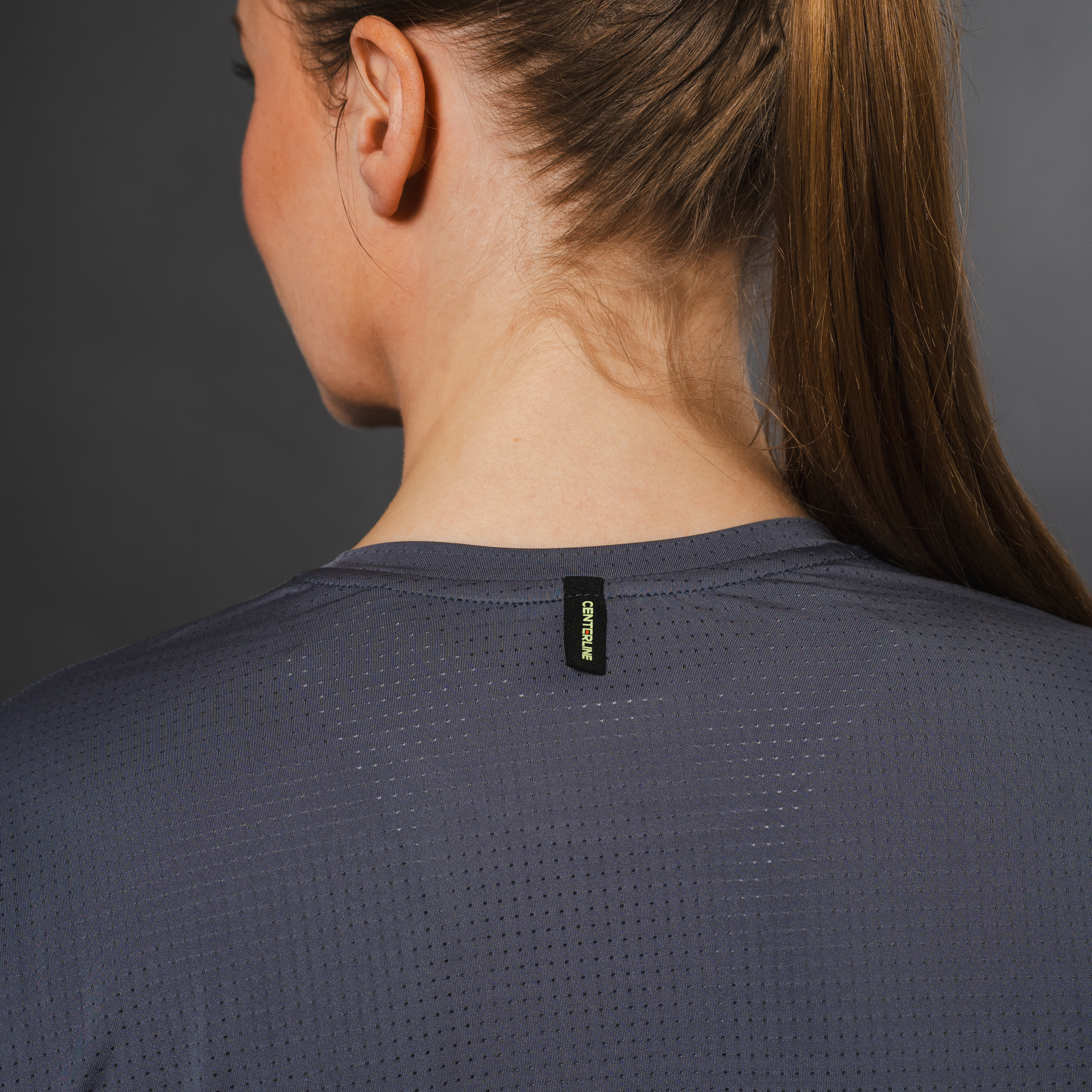 AirLite Women's Long Sleeve - FORWRD - Introducing the AirLite Women's Long Sleeve top, engineered with innovative GripTek™ textured knit on the sleeve cuffs. This top doubles as a convenient towel for quick perspiration management during matches. Experience next-level performance and functionality with this essential piece, ensuring you stay focused and comfortable on the court. Elevate your game with every serve, volley, and smash in this game-changing top.