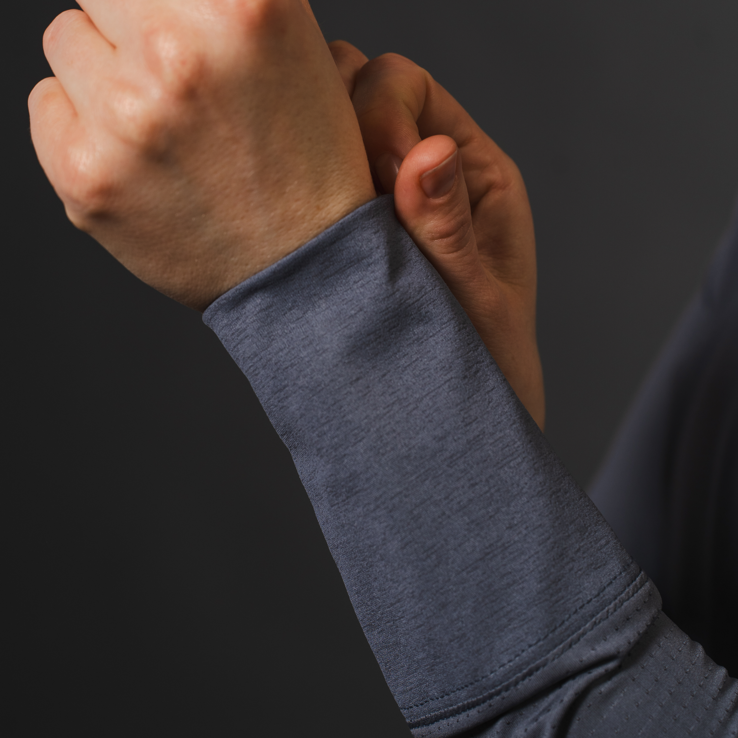 AirLite Women's Long Sleeve - FORWRD - Introducing the AirLite Women's Long Sleeve top, engineered with innovative GripTek™ textured knit on the sleeve cuffs. This top doubles as a convenient towel for quick perspiration management during matches. Experience next-level performance and functionality with this essential piece, ensuring you stay focused and comfortable on the court. Elevate your game with every serve, volley, and smash in this game-changing top.