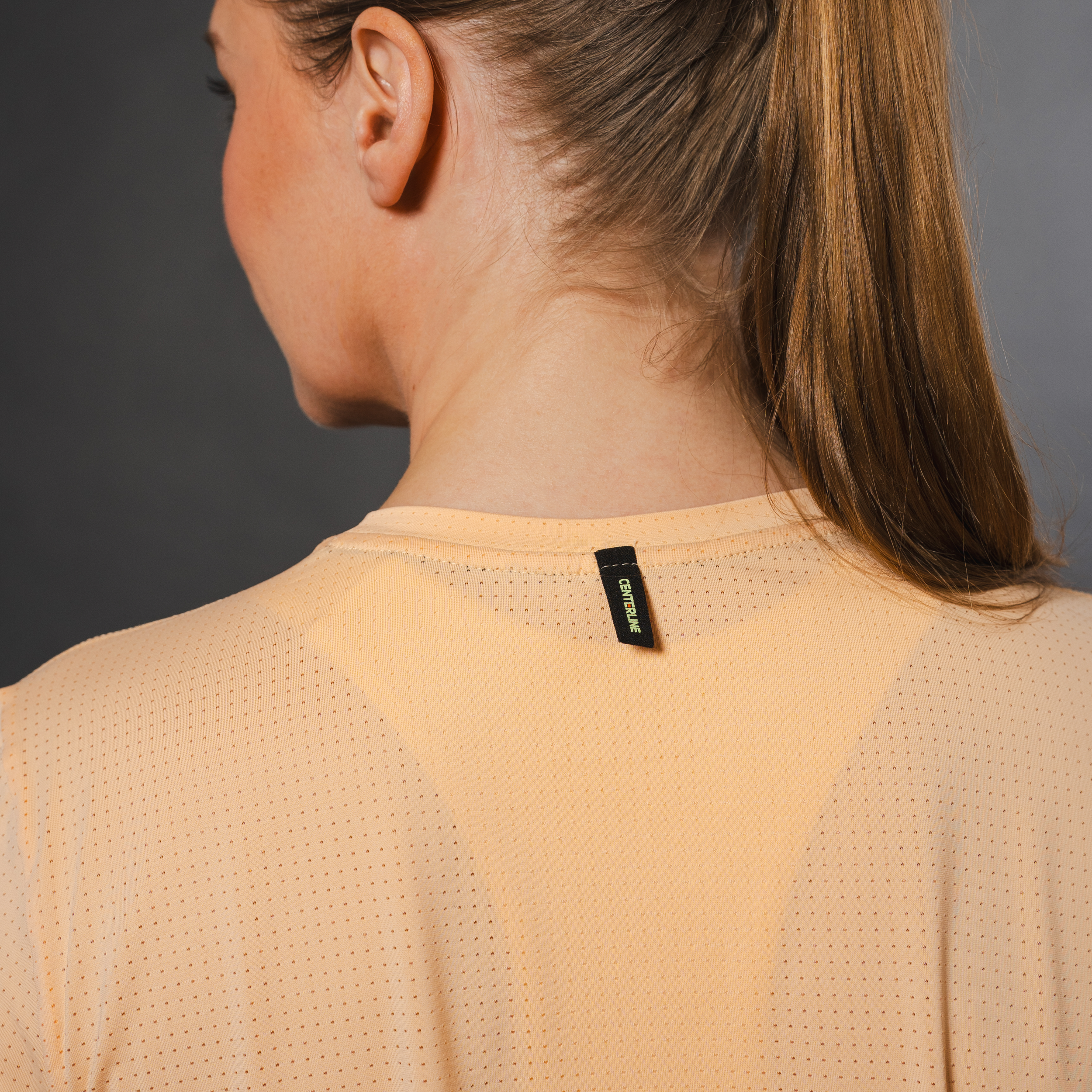 AirLite Women's Long Sleeve - FORWRD - Introducing the AirLite Women's Long Sleeve top, engineered with innovative GripTek™ textured knit on the sleeve cuffs. This top doubles as a convenient towel for quick perspiration management during matches. Experience next-level performance and functionality with this essential piece, ensuring you stay focused and comfortable on the court. Elevate your game with every serve, volley, and smash in this game-changing top.