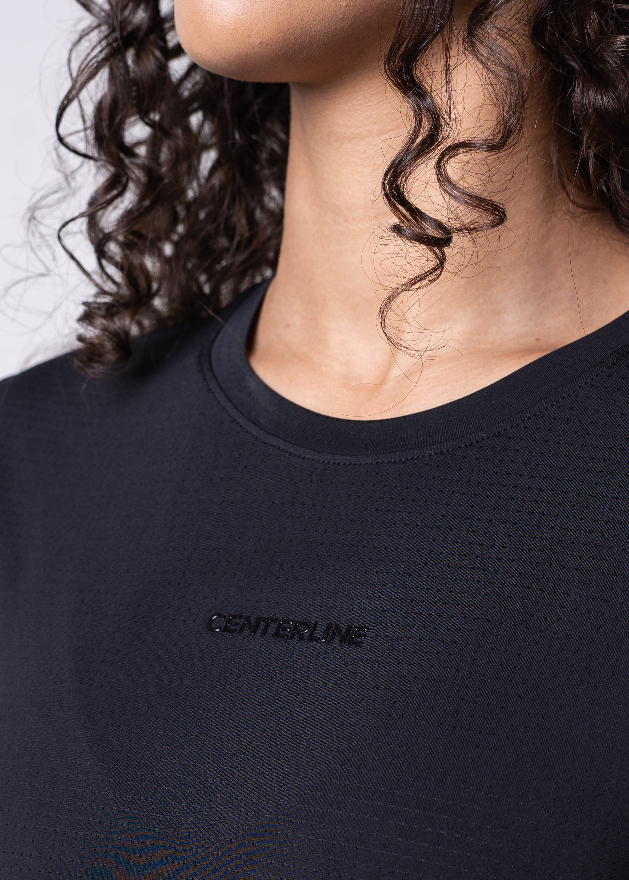 AirLite Women's Tee - FORWRD - Elevate your game with the AirLite Women's Tee, engineered from ultra-breathable mesh fabric for unmatched ventilation during pickleball play. Curved hem ensures confidence in every move, allowing you to showcase your agility without compromising on comfort. Experience the perfect blend of style and performance with this essential addition to your wardrobe.