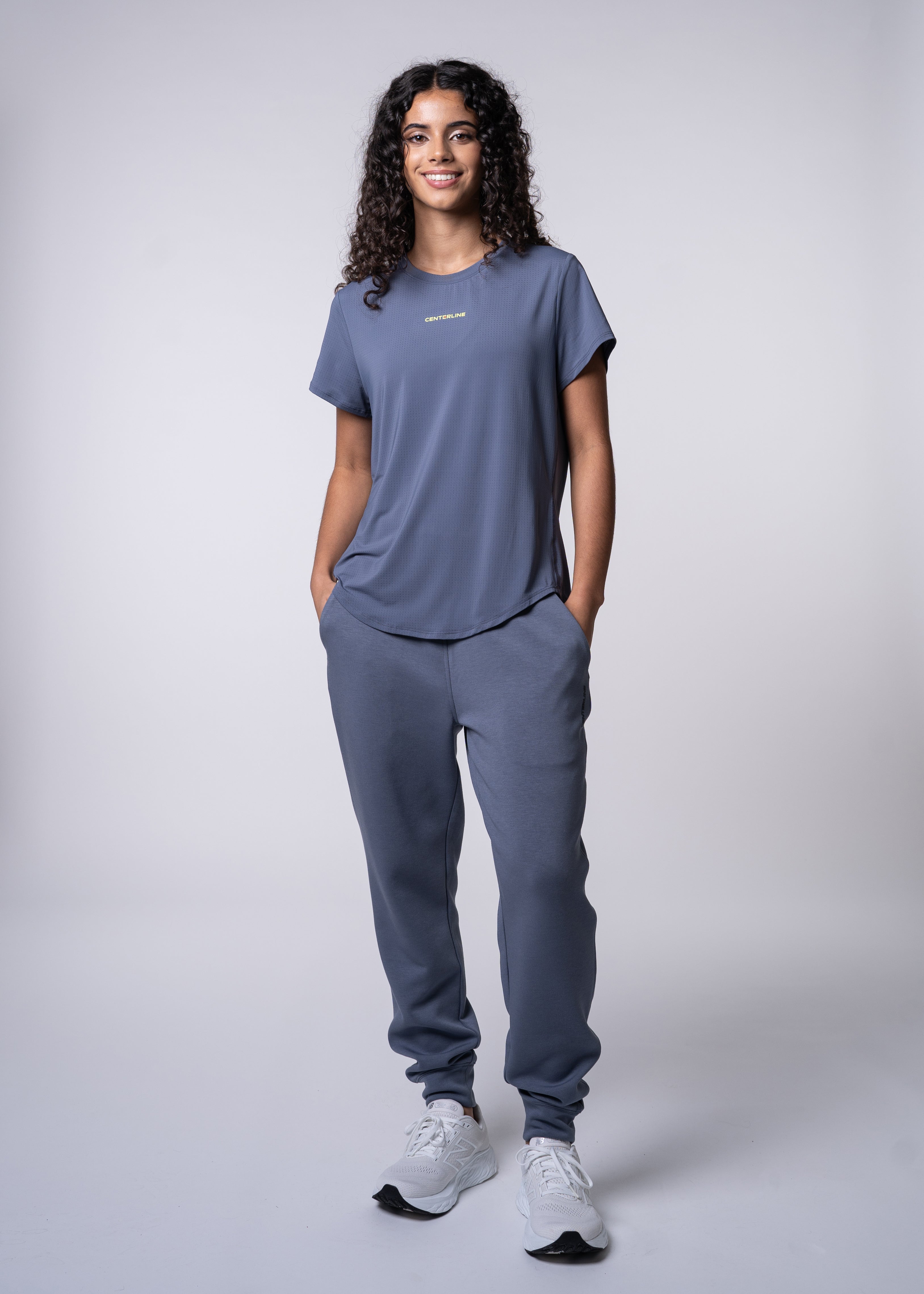 AirLite Women's Tee - FORWRD - Elevate your game with the AirLite Women's Tee, engineered from ultra-breathable mesh fabric for unmatched ventilation during pickleball play. Curved hem ensures confidence in every move, allowing you to showcase your agility without compromising on comfort. Experience the perfect blend of style and performance with this essential addition to your wardrobe.