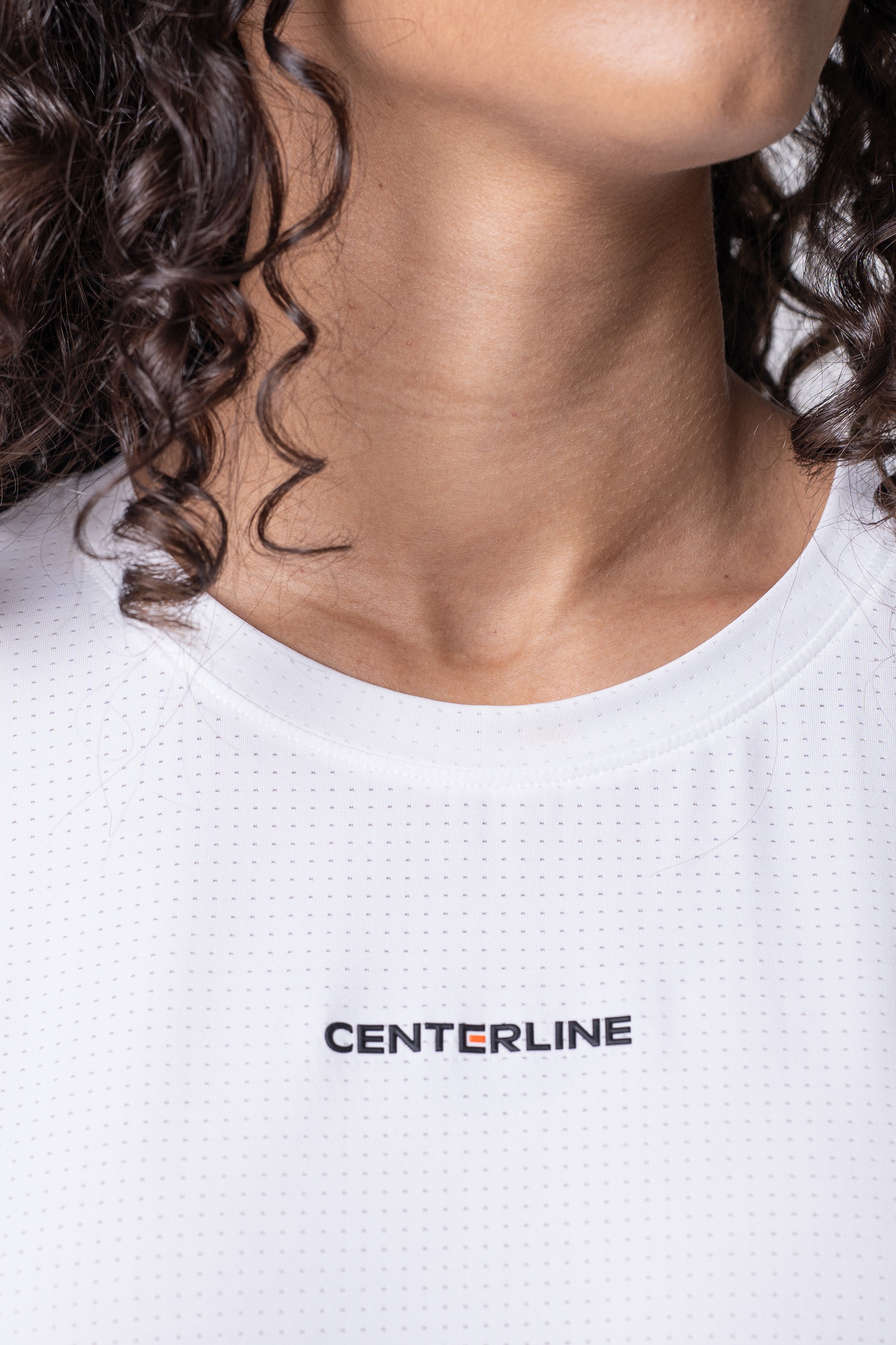 AirLite Women's Tee - FORWRD - Elevate your game with the AirLite Women's Tee, engineered from ultra-breathable mesh fabric for unmatched ventilation during pickleball play. Curved hem ensures confidence in every move, allowing you to showcase your agility without compromising on comfort. Experience the perfect blend of style and performance with this essential addition to your wardrobe.