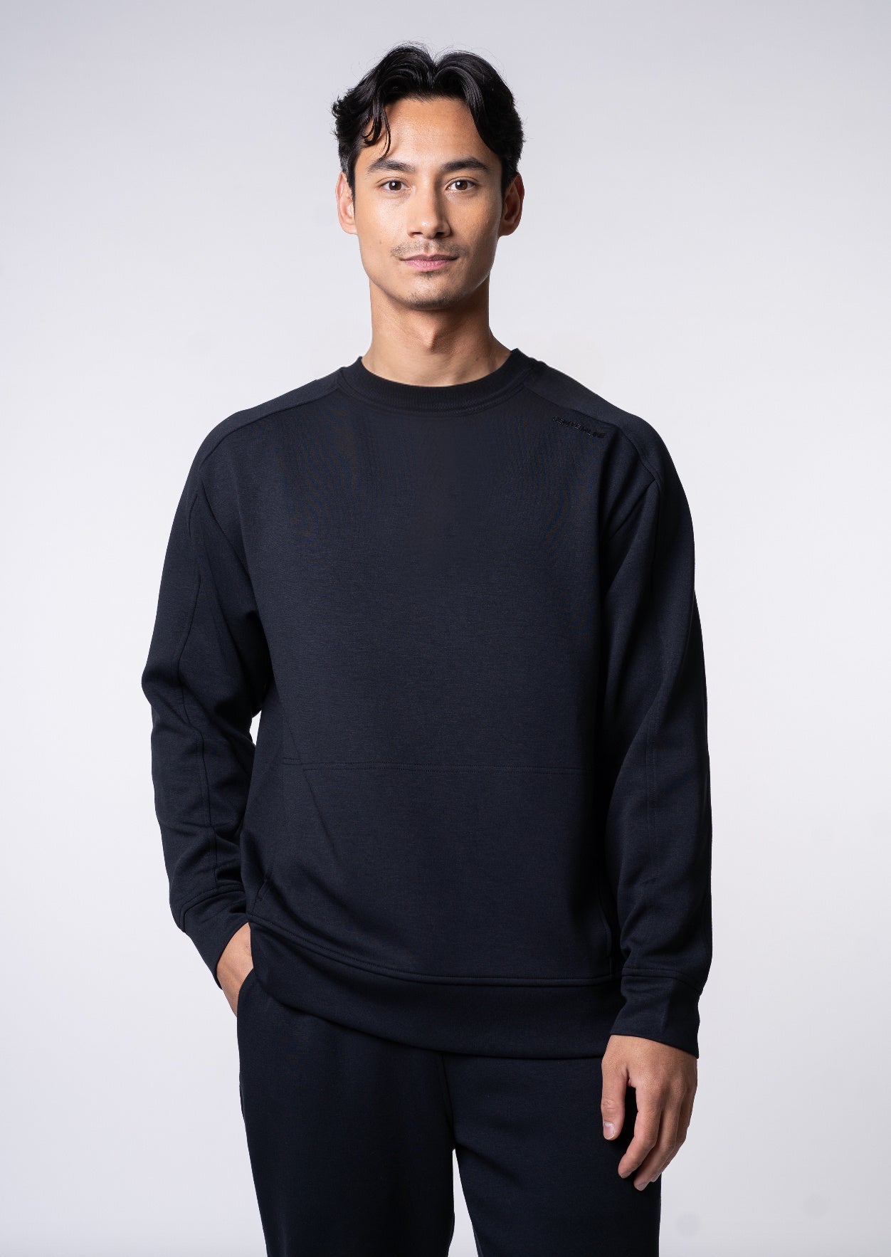 Apres Unisex Crew Sweatshirt - FORWRD - The ultimate post-game pullover, designed with a relaxed varsity-inspired fit for comfort and style. Soft and comfortable, water repellent fabric helps protect you from the elements. Front hand pockets offer a secure phone storage option, adding practicality to this street-style piece that easily transitions from court to casual activities. This unisex crew sweatshirt has an athletic fit