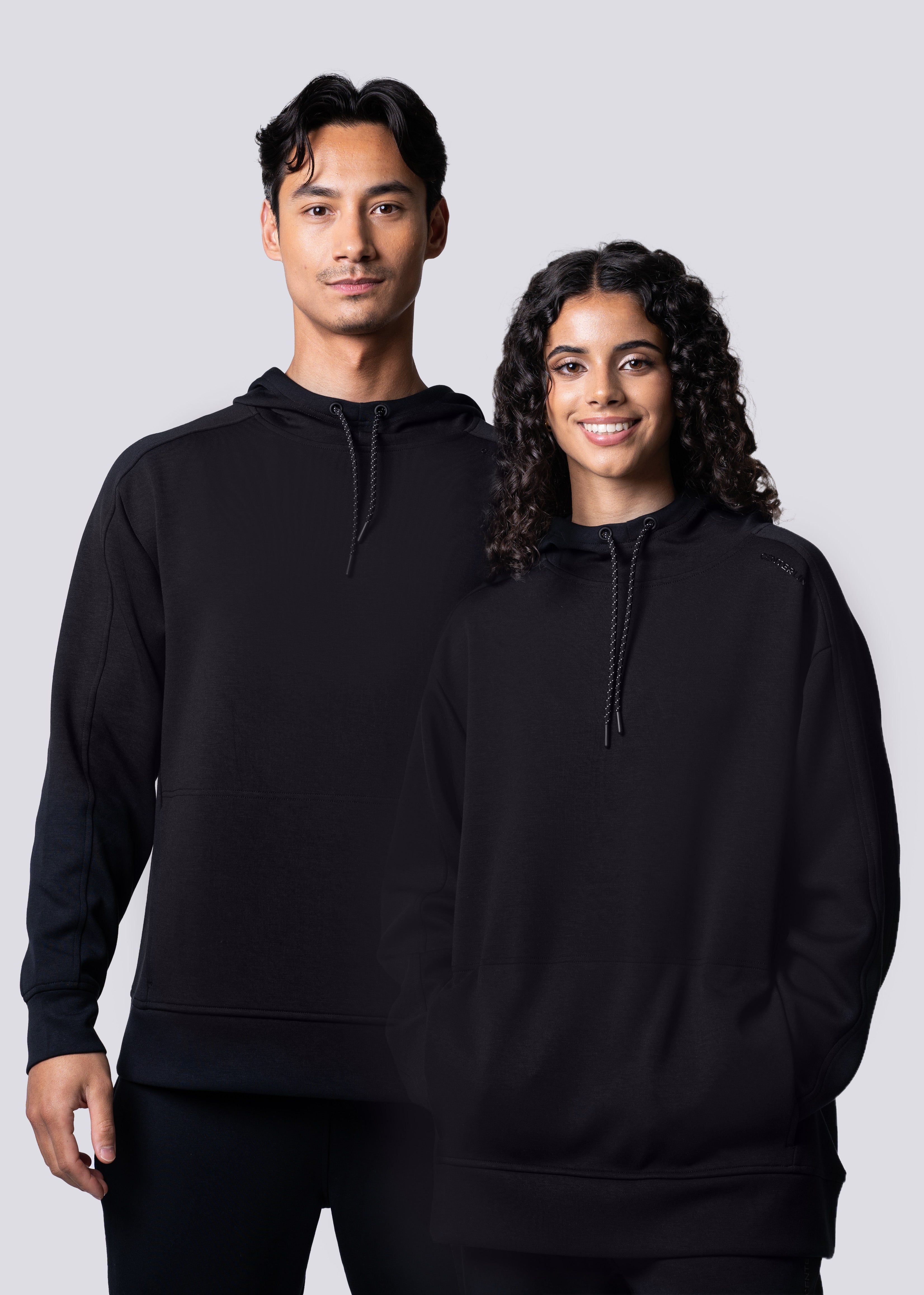Apres Unisex Hooded Sweatshirt - FORWRD - The ultimate post-game hooded pullover, designed with a relaxed varsity-inspired fit for comfort and style. Soft and comfortable, water repellent fabric, with a fully functional hood with adjustable draw cord helps keep you protected from the elements. Front hand pockets offer a secure phone storage option, adding practicality to this street-style piece that easily transitions from court to casual activities. This unisex hoodie has an athletic fit