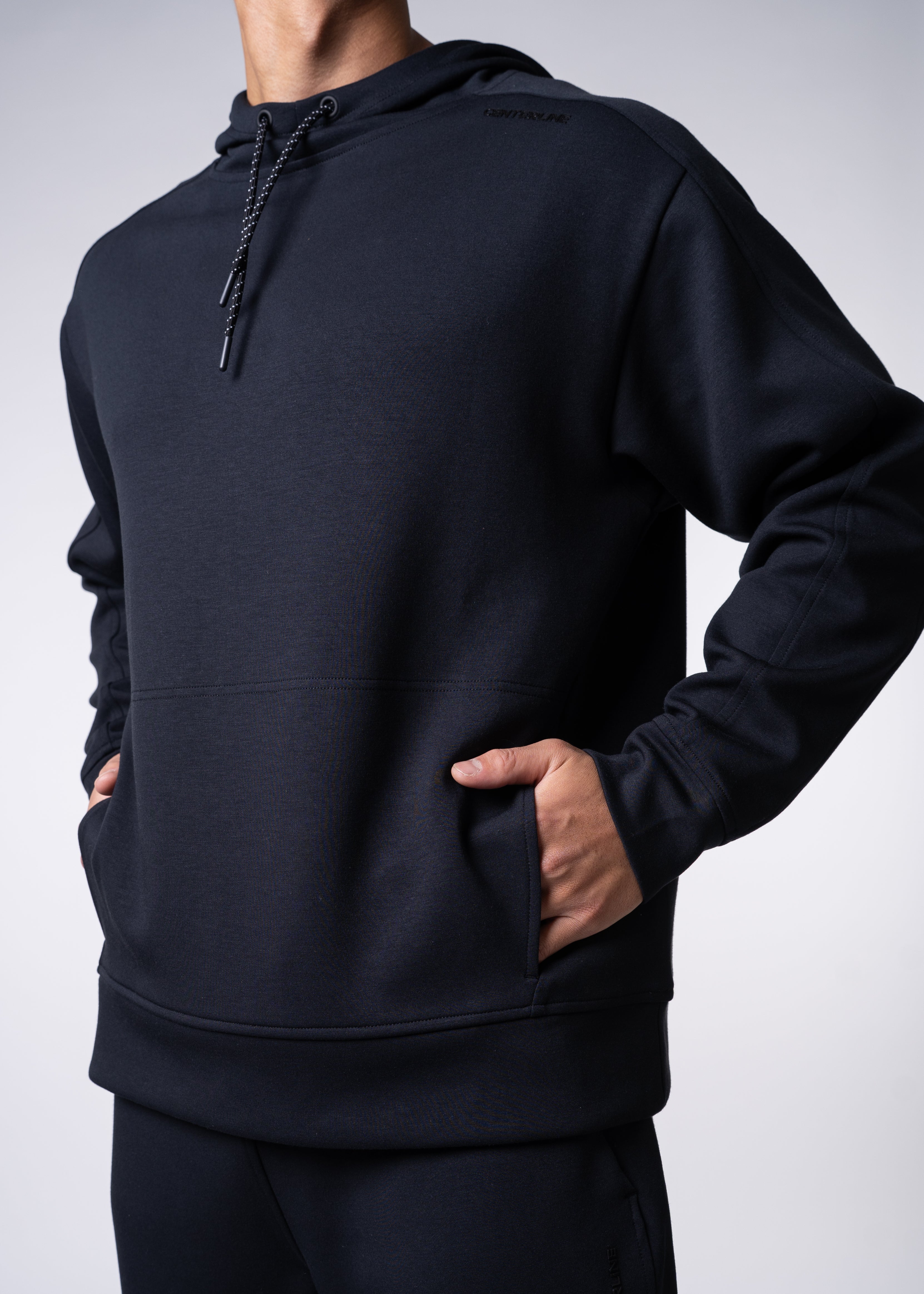 Apres Unisex Hooded Sweatshirt - FORWRD - The ultimate post-game hooded pullover, designed with a relaxed varsity-inspired fit for comfort and style. Soft and comfortable, water repellent fabric, with a fully functional hood with adjustable draw cord helps keep you protected from the elements. Front hand pockets offer a secure phone storage option, adding practicality to this street-style piece that easily transitions from court to casual activities. This unisex hoodie has an athletic fit