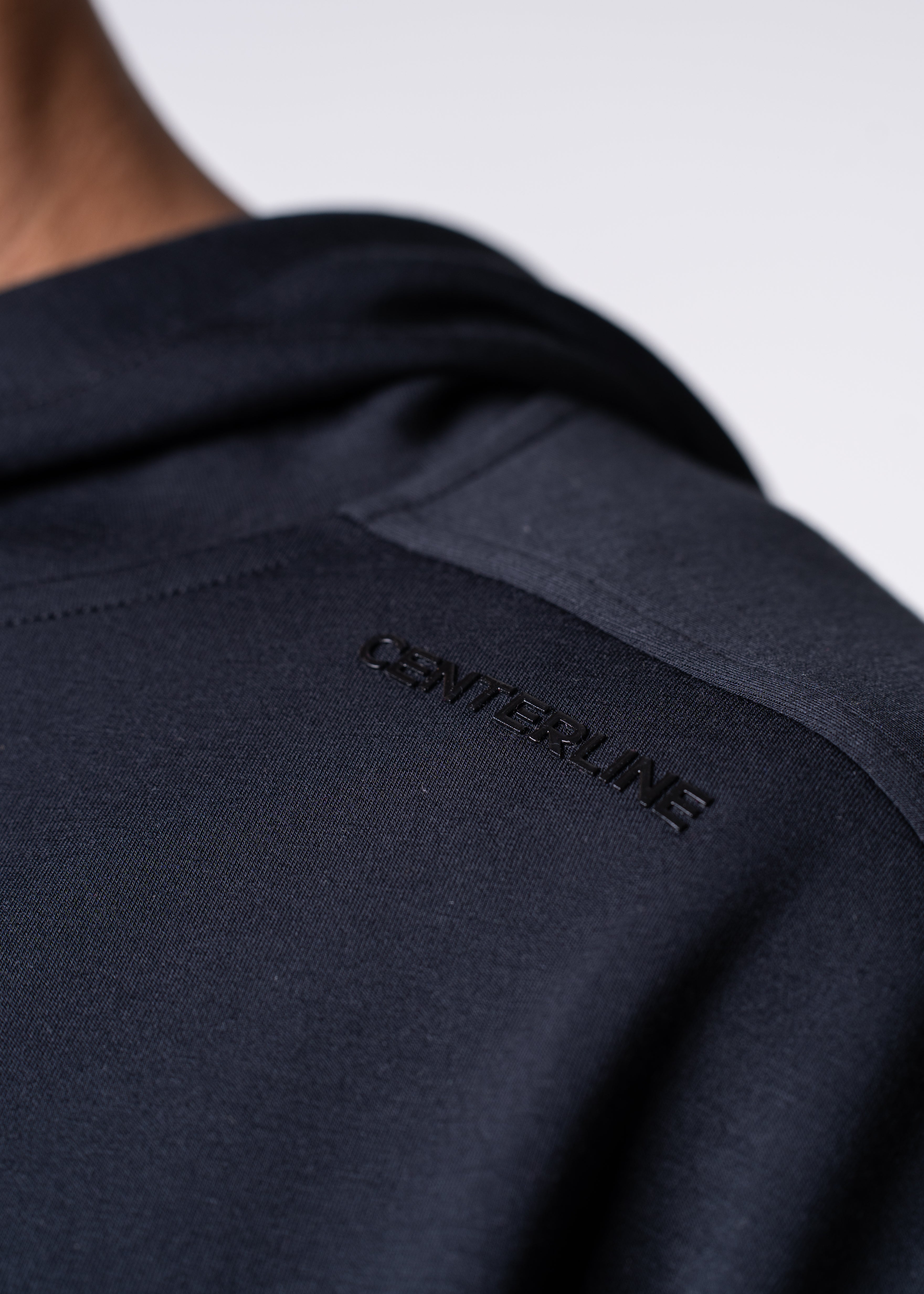 Apres Unisex Hooded Sweatshirt - FORWRD - The ultimate post-game hooded pullover, designed with a relaxed varsity-inspired fit for comfort and style. Soft and comfortable, water repellent fabric, with a fully functional hood with adjustable draw cord helps keep you protected from the elements. Front hand pockets offer a secure phone storage option, adding practicality to this street-style piece that easily transitions from court to casual activities. This unisex hoodie has an athletic fit