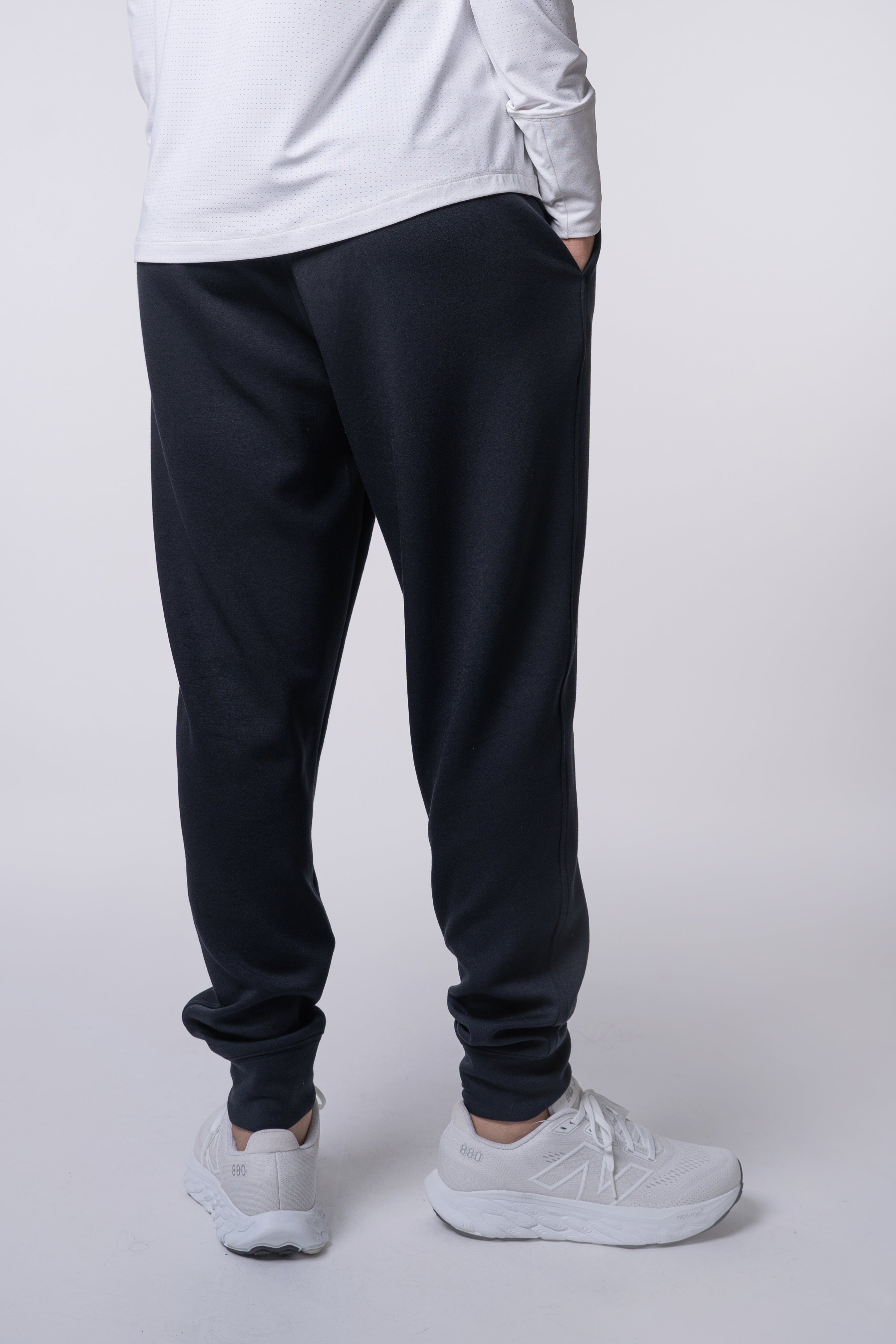 Apres Women's Jogger - FORWRD - Her go-to Apres Play jogger, featuring an easy pull-on waistband and relaxed fit for post-game comfort. Soft and comfortable water repellent fabric helps protect you from the elements, while front hand pockets add convenient storage. With a streetwear-inspired look and functional design, these joggers transition seamlessly from court to street.
