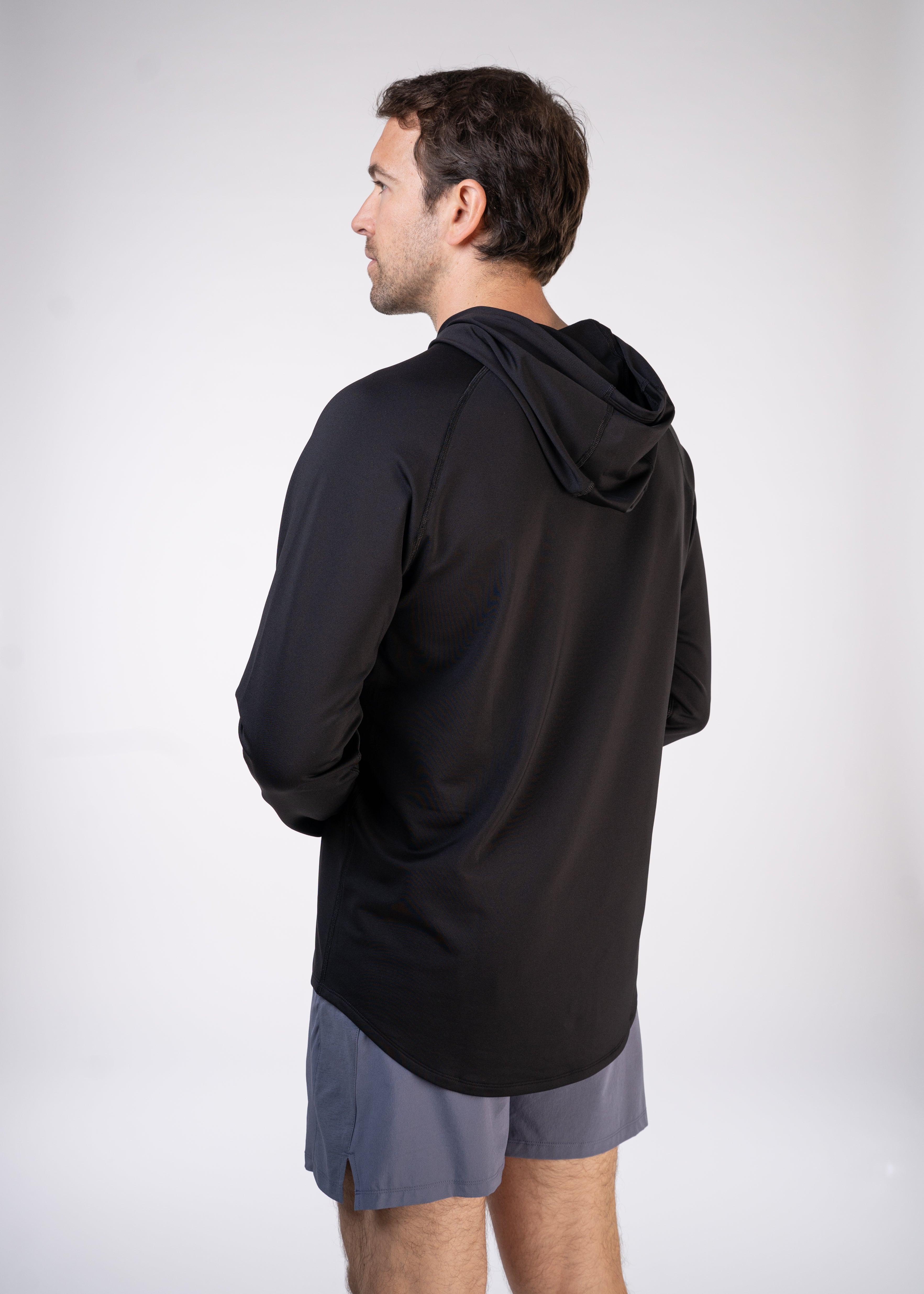 Layering Hoodie Men's - FORWRD - Stay cool and comfortable with our performance-enhanced fabric, designed to regulate your temperature on and off the court. The curved hem allows for freedom of movement, while the extended back hem offers added coverage. Keep your sleeves secure with our discreet thumbholes—perfect for those chilly morning warm-ups or brisk climate play. This top is ideal for layering during warm-ups or tackling cooler conditions in style.