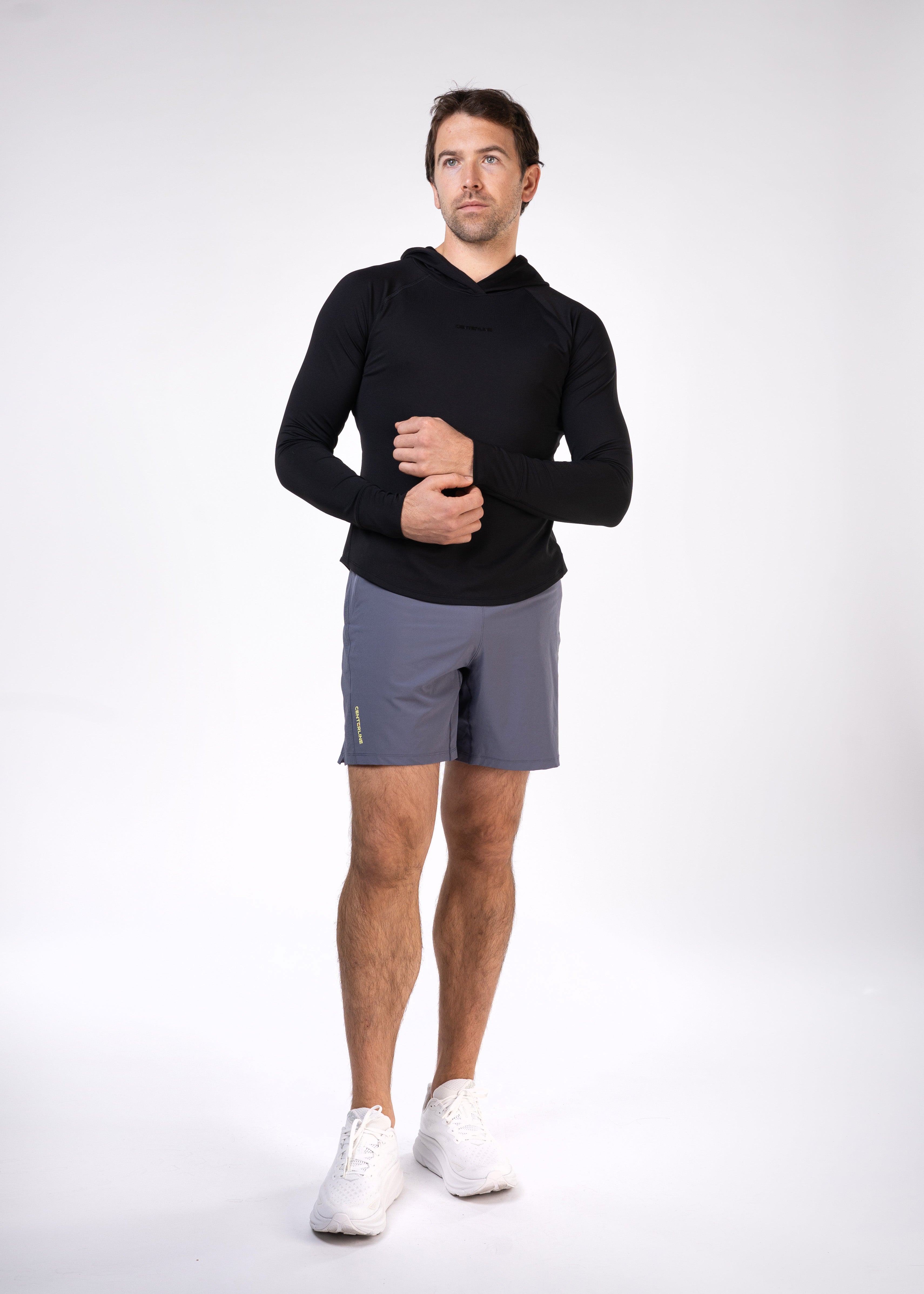 Layering Hoodie Men's - FORWRD - Stay cool and comfortable with our performance-enhanced fabric, designed to regulate your temperature on and off the court. The curved hem allows for freedom of movement, while the extended back hem offers added coverage. Keep your sleeves secure with our discreet thumbholes—perfect for those chilly morning warm-ups or brisk climate play. This top is ideal for layering during warm-ups or tackling cooler conditions in style.