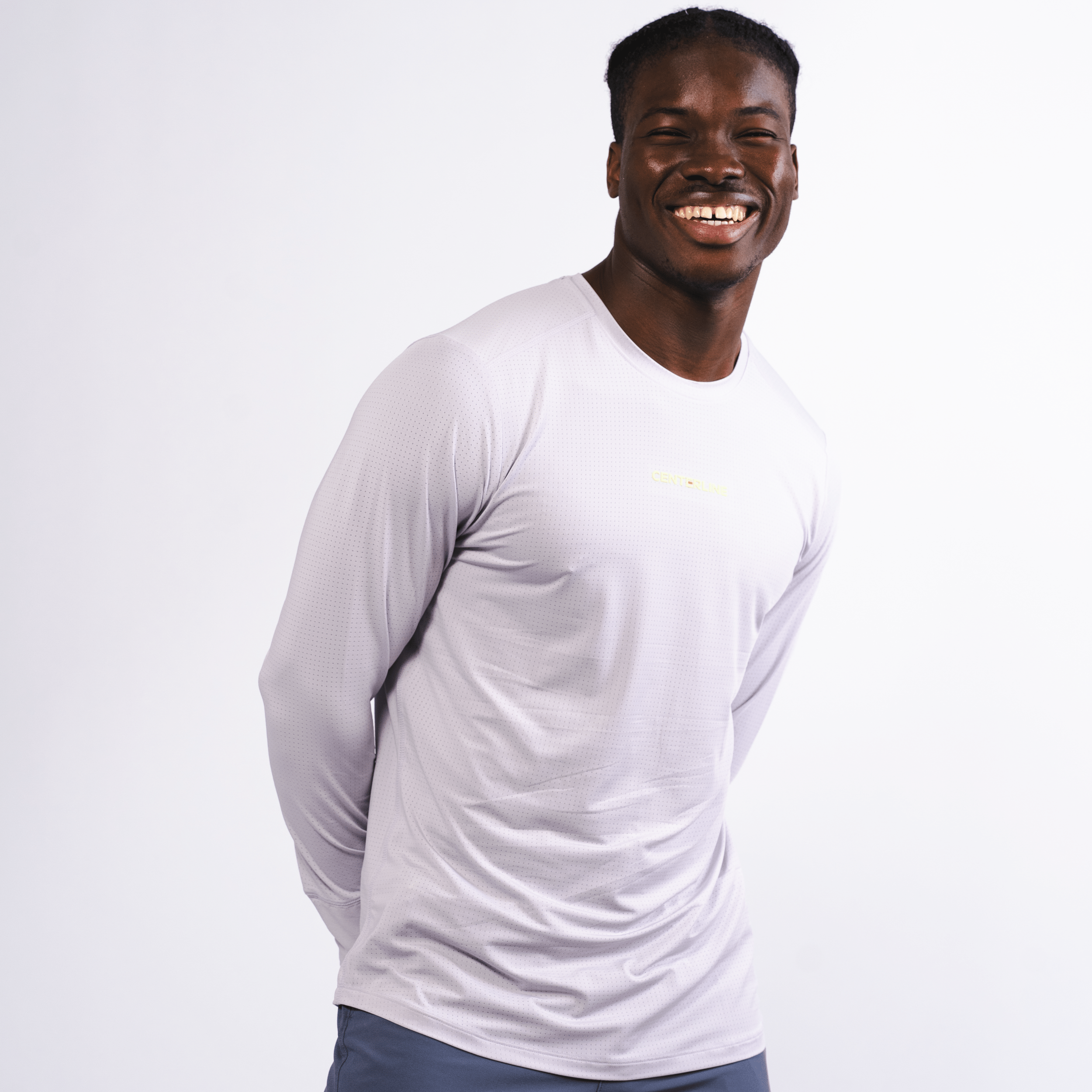 AirLite Men's Long Sleeve - FORWRD - Introducing the AirLite Men's Long Sleeve top, engineered with innovative GripTek™ textured knit on the sleeve cuffs. This top doubles as a convenient towel for quick perspiration management during matches. Experience next-level performance and functionality with this essential piece, ensuring you stay focused and comfortable on the court. Elevate your game with every serve, volley, and smash in this game-changing top.