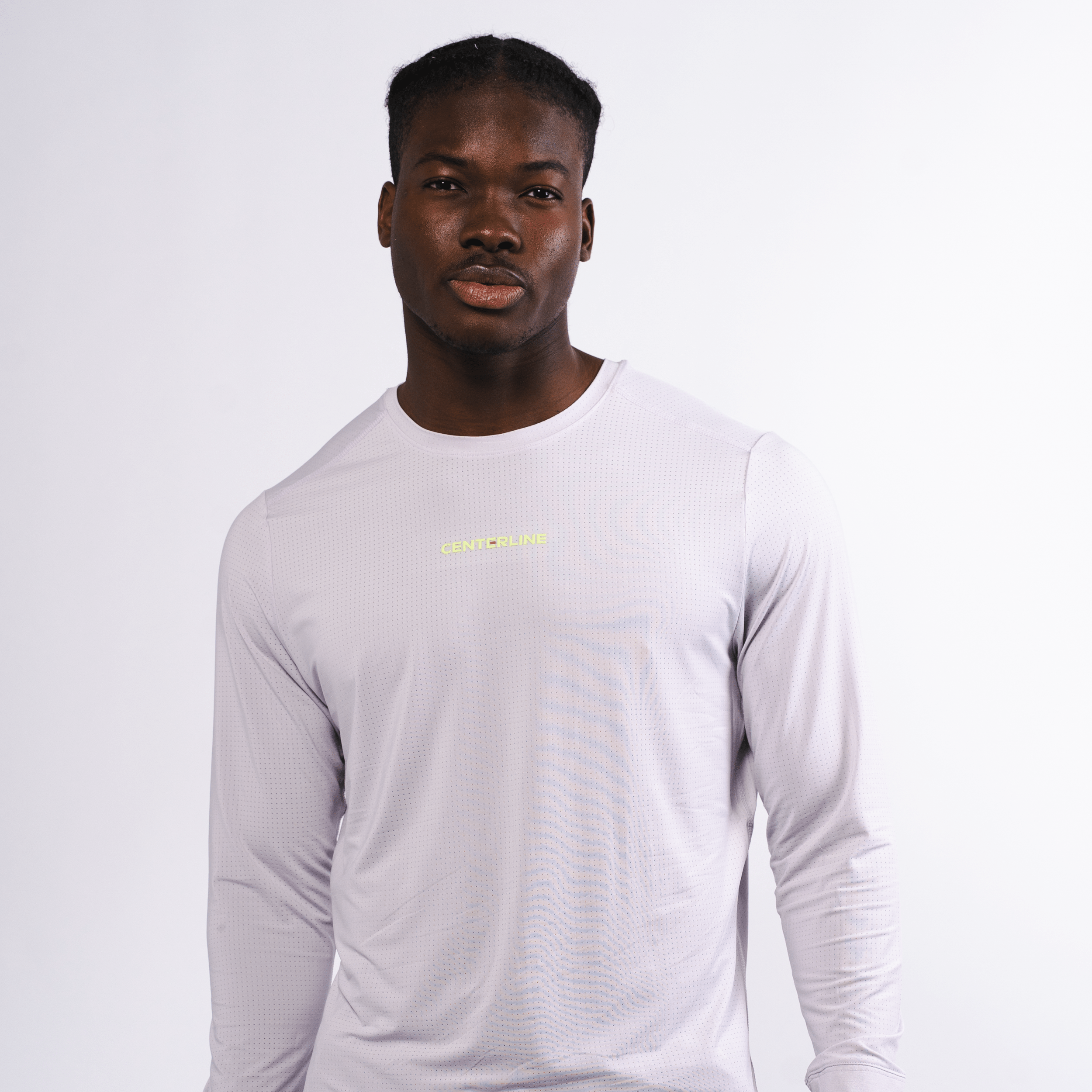 AirLite Men's Long Sleeve - FORWRD - Introducing the AirLite Men's Long Sleeve top, engineered with innovative GripTek™ textured knit on the sleeve cuffs. This top doubles as a convenient towel for quick perspiration management during matches. Experience next-level performance and functionality with this essential piece, ensuring you stay focused and comfortable on the court. Elevate your game with every serve, volley, and smash in this game-changing top.