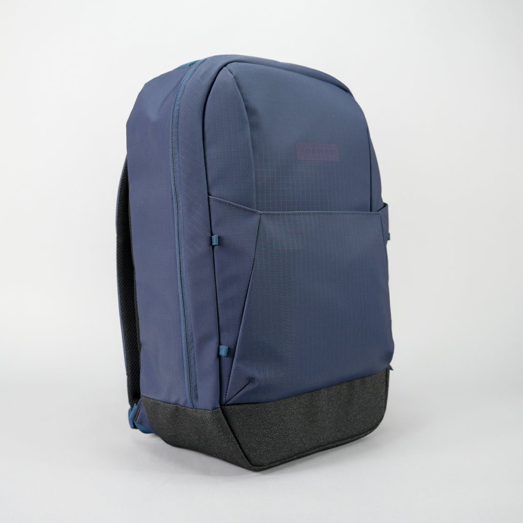 Blue backpack with black base on a white background