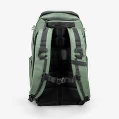 Green backpack with black straps on a white background