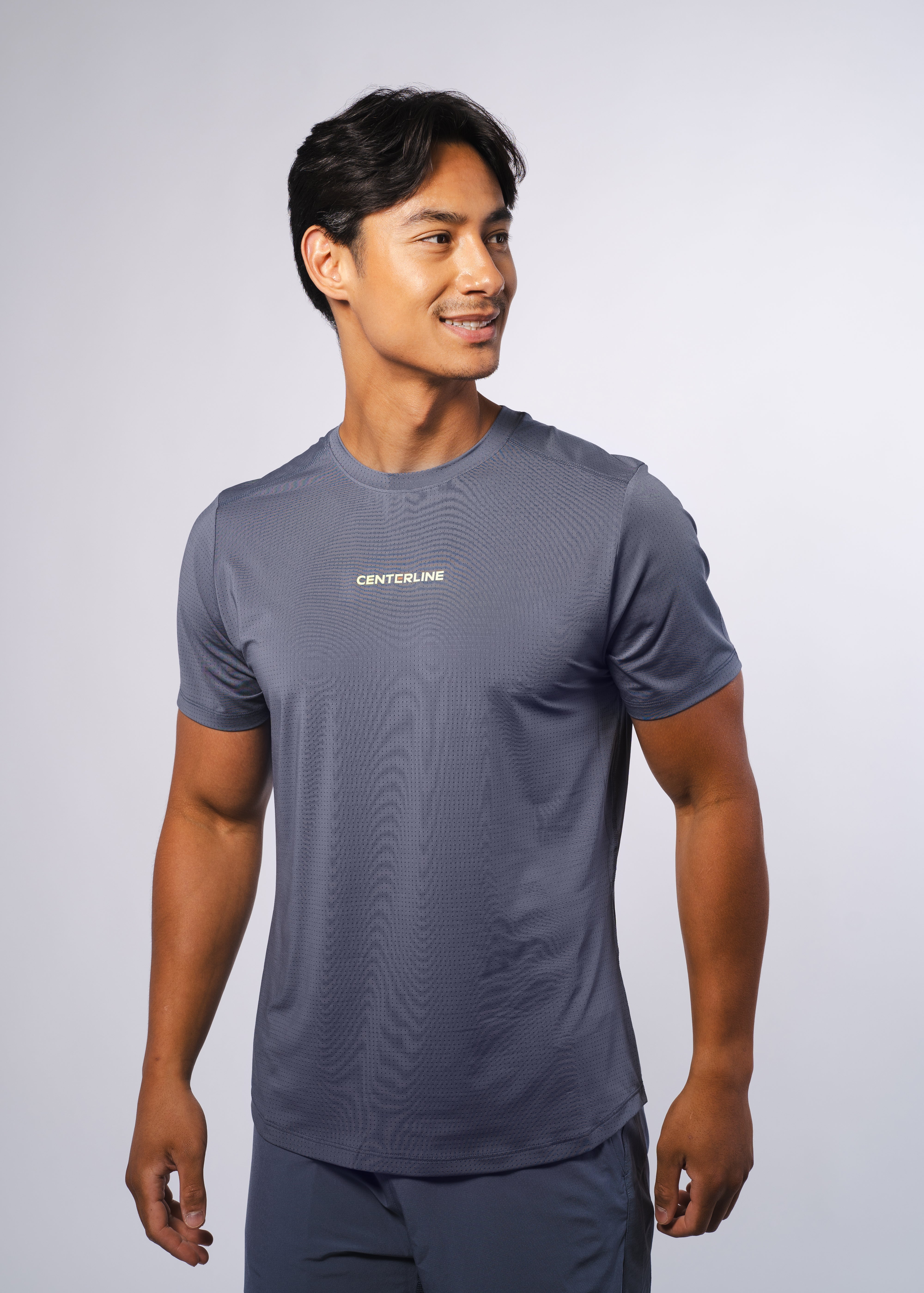 AirLite Men's Tee - FORWRD  -  Elevate your game with the AirLite Men's Tee, engineered from ultra-breathable mesh fabric for unmatched ventilation during pickleball play. Curved hem ensures confidence in every move, allowing you to showcase your agility without compromising on comfort. Experience the perfect blend of style and performance with this essential addition to your wardrobe.