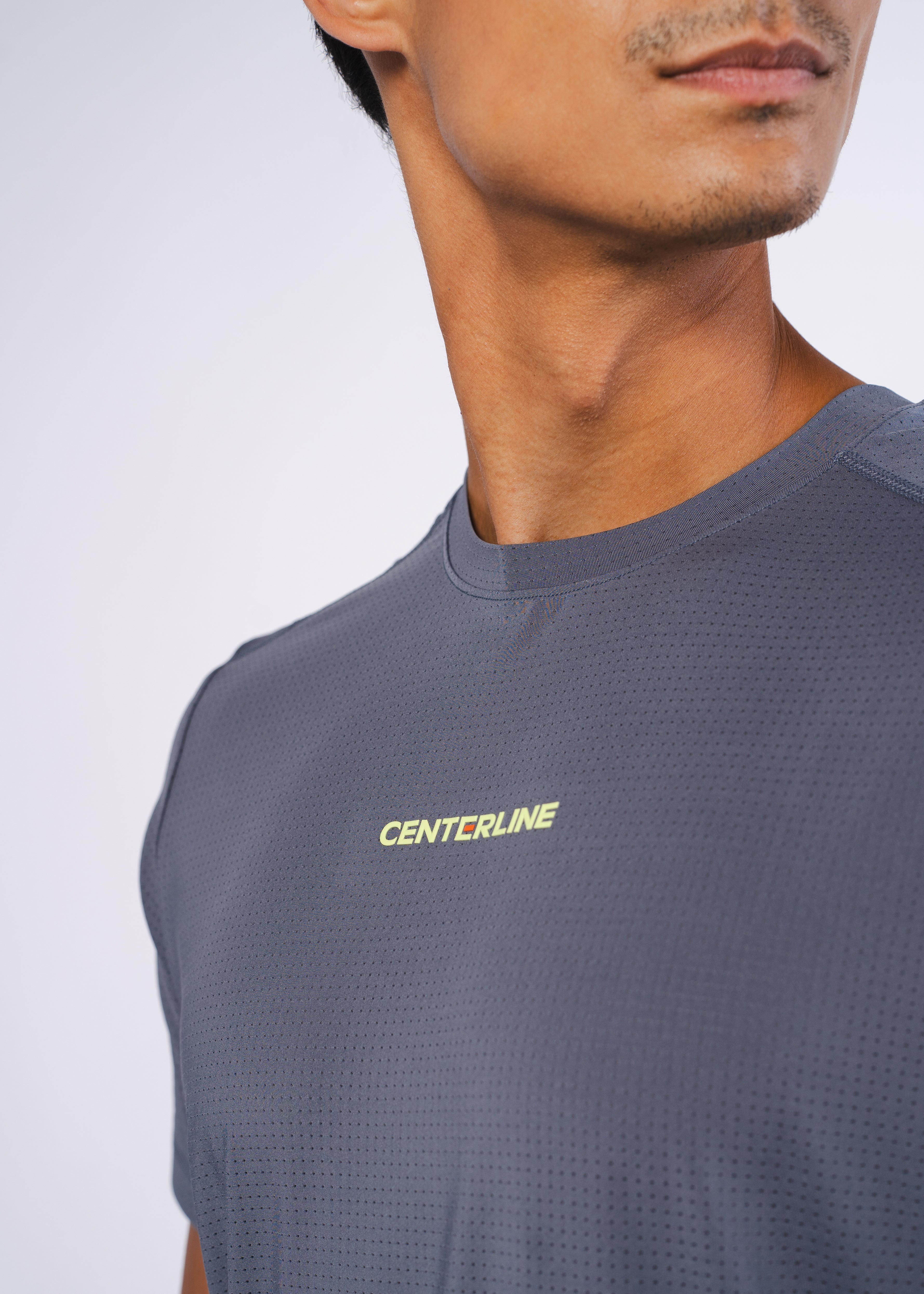 AirLite Men's Tee - FORWRD  -  Elevate your game with the AirLite Men's Tee, engineered from ultra-breathable mesh fabric for unmatched ventilation during pickleball play. Curved hem ensures confidence in every move, allowing you to showcase your agility without compromising on comfort. Experience the perfect blend of style and performance with this essential addition to your wardrobe.