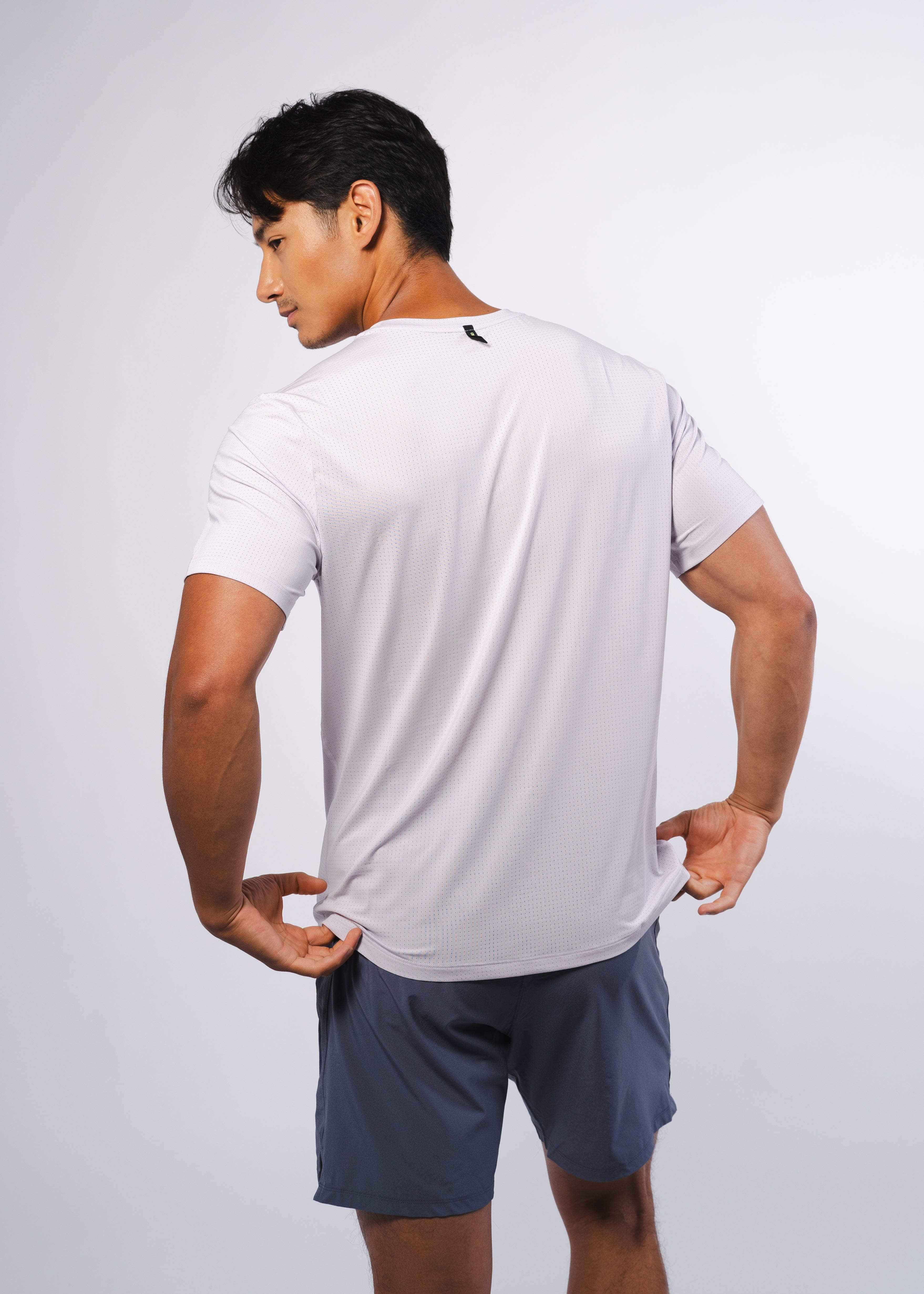 AirLite Men's Tee - FORWRD  -  Elevate your game with the AirLite Men's Tee, engineered from ultra-breathable mesh fabric for unmatched ventilation during pickleball play. Curved hem ensures confidence in every move, allowing you to showcase your agility without compromising on comfort. Experience the perfect blend of style and performance with this essential addition to your wardrobe.