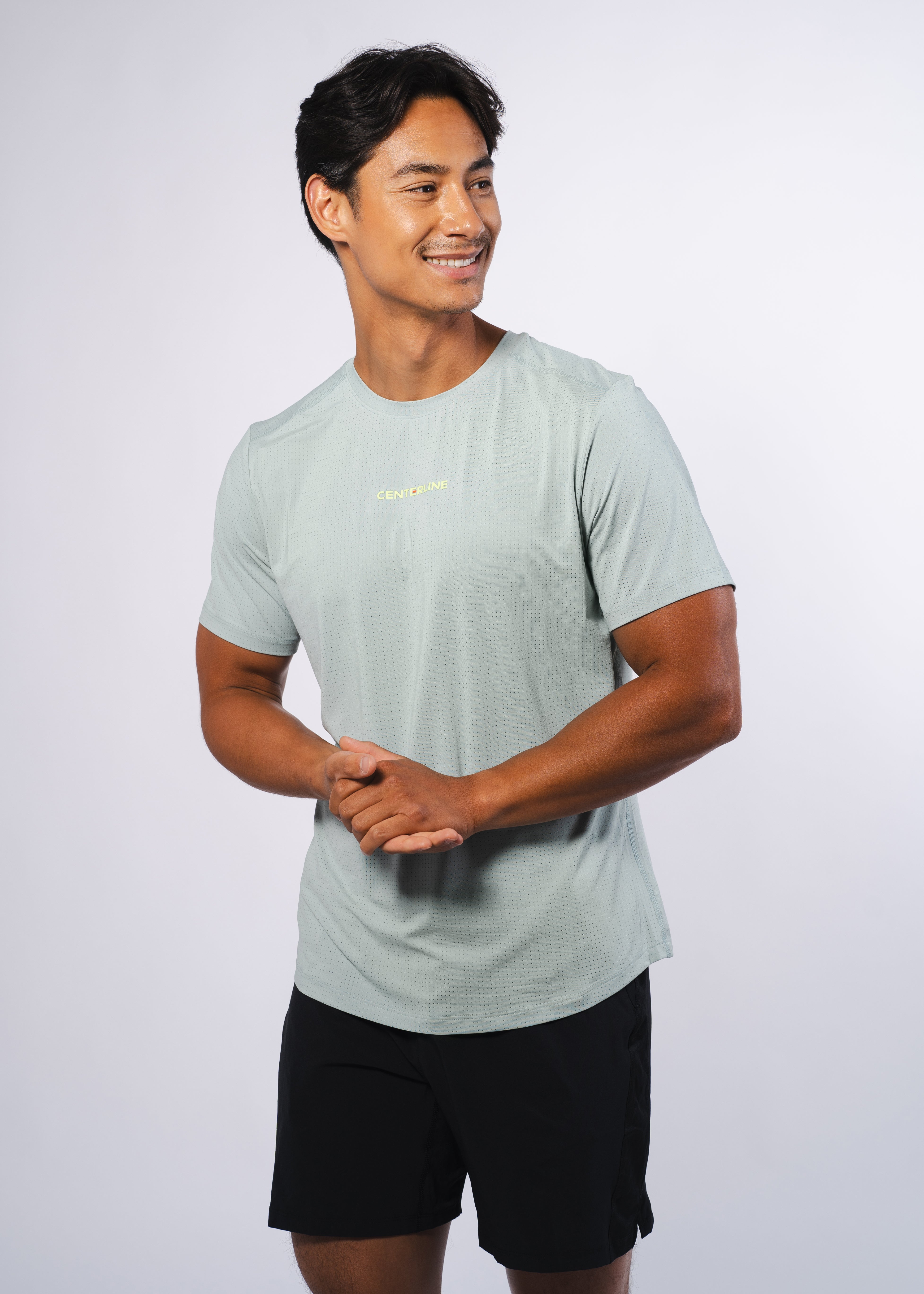 AirLite Men's Tee - FORWRD  -  Elevate your game with the AirLite Men's Tee, engineered from ultra-breathable mesh fabric for unmatched ventilation during pickleball play. Curved hem ensures confidence in every move, allowing you to showcase your agility without compromising on comfort. Experience the perfect blend of style and performance with this essential addition to your wardrobe.