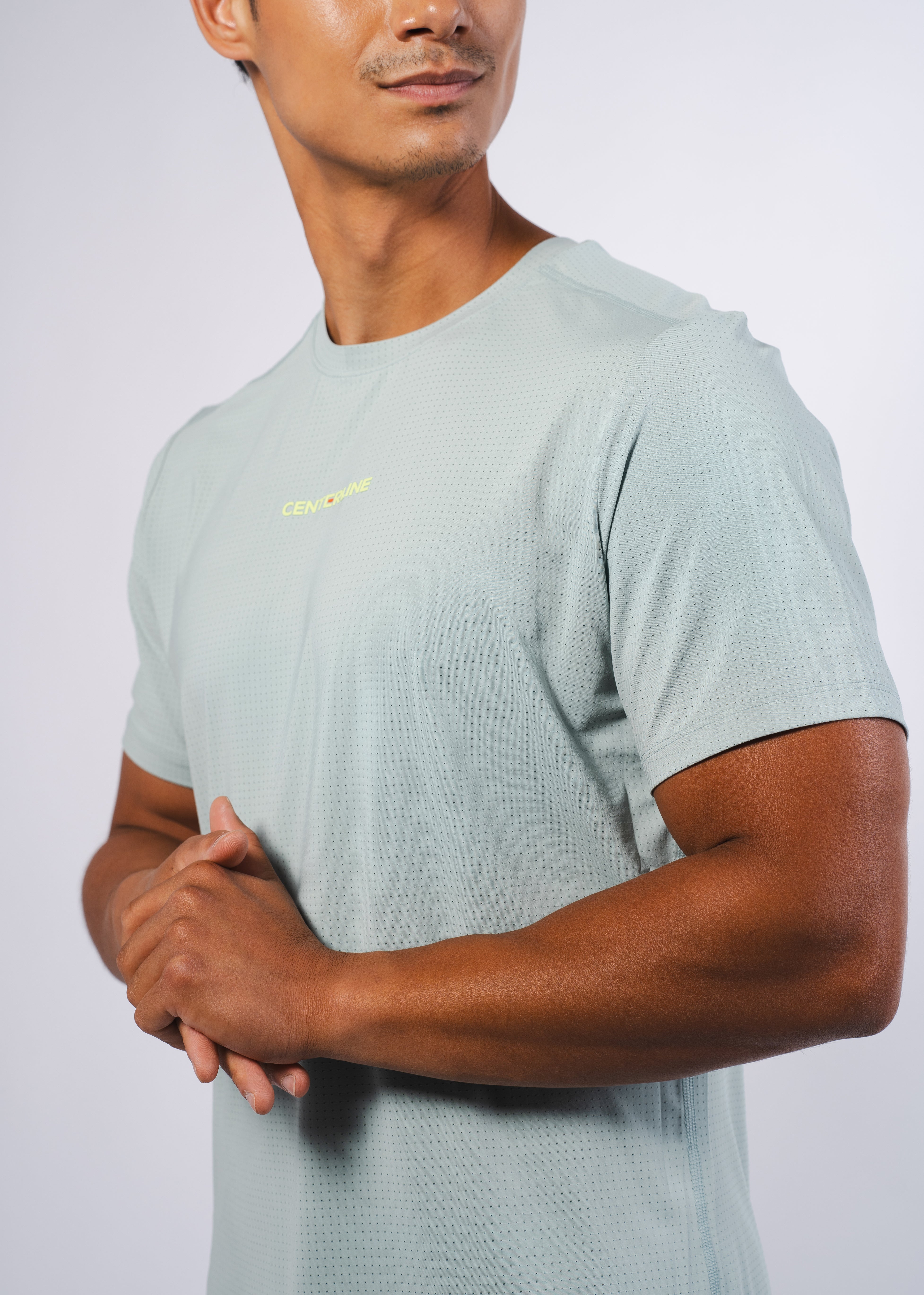 AirLite Men's Tee - FORWRD  -  Elevate your game with the AirLite Men's Tee, engineered from ultra-breathable mesh fabric for unmatched ventilation during pickleball play. Curved hem ensures confidence in every move, allowing you to showcase your agility without compromising on comfort. Experience the perfect blend of style and performance with this essential addition to your wardrobe.