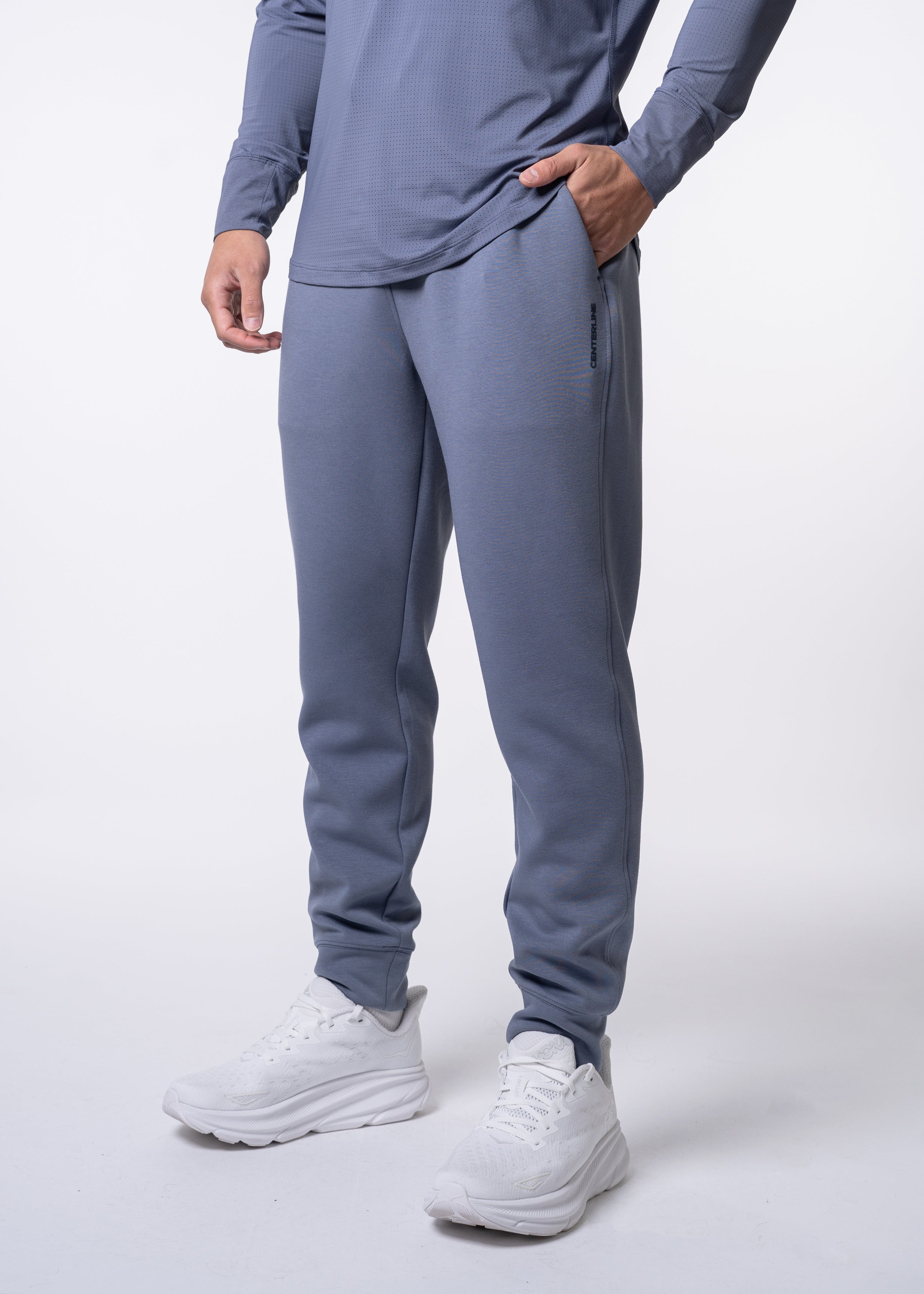 Apres Men's Jogger - FORWRD  -  His go-to Apres Play jogger, featuring an easy pull-on waistband with drawcord for adjustability and relaxed fit for post-game comfort. Soft and comfortable water repellent fabric helps protect you from the elements, while front hand pockets add convenient storage. With a streetwear-inspired look and functional design, these joggers transition seamlessly from court to street.