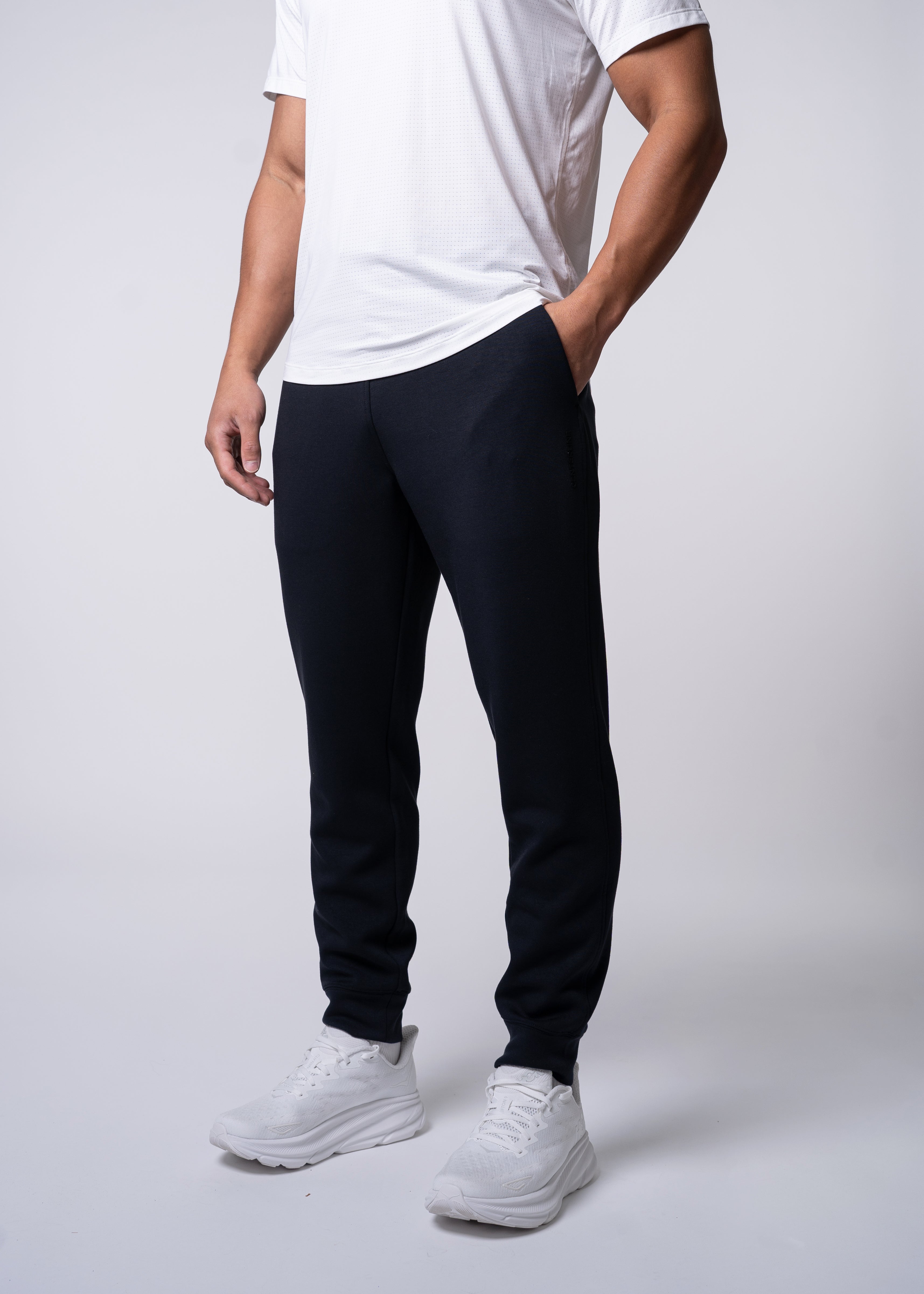 Apres Men's Jogger - FORWRD  -  His go-to Apres Play jogger, featuring an easy pull-on waistband with drawcord for adjustability and relaxed fit for post-game comfort. Soft and comfortable water repellent fabric helps protect you from the elements, while front hand pockets add convenient storage. With a streetwear-inspired look and functional design, these joggers transition seamlessly from court to street.