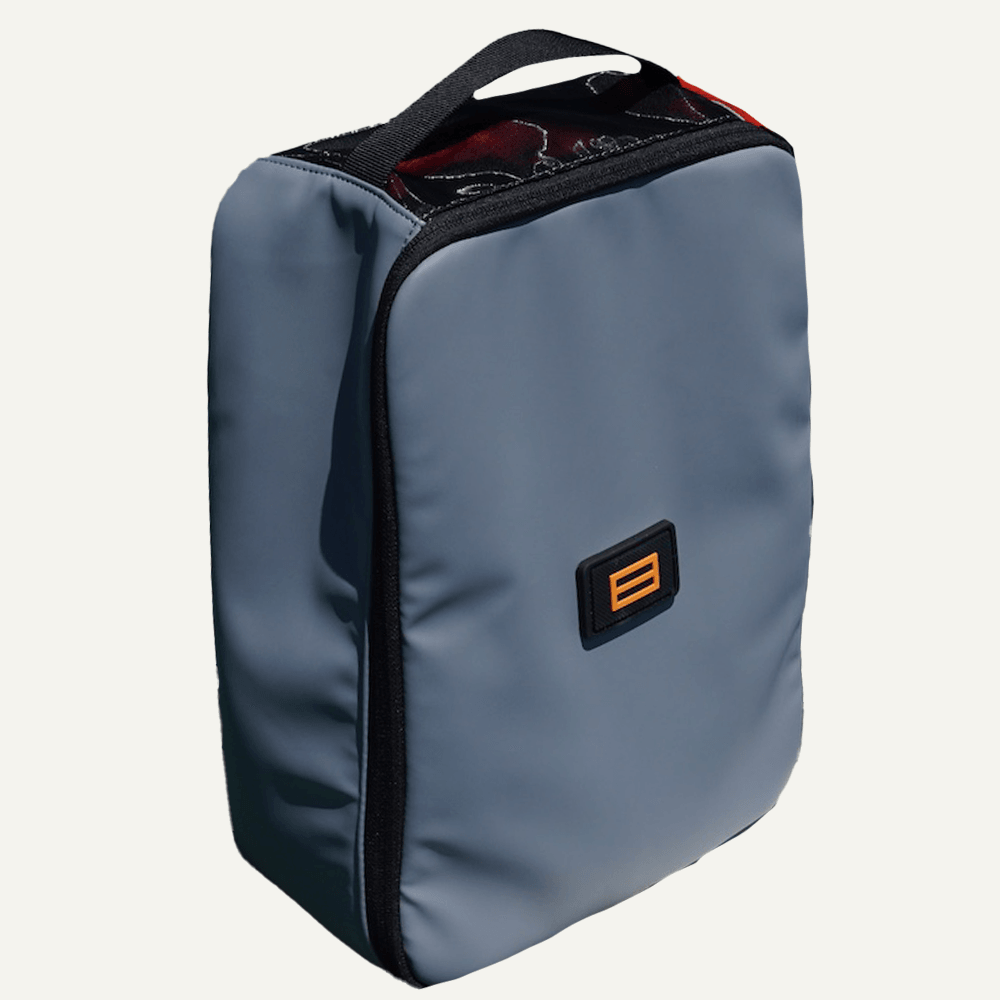 Court Caddy Shoe Cube - FORWRD  -  The shoe cube pairs perfectly with the Court Caddy and attaches directly to the front of the bag with g-hooks or can be conveniently carried with a top handle on the shoe cube. Fits up to size 15 men's court shoes Easy to wipe down the interior Ventilated Top Premium PU material YKK Zippers TPU Coated Nylon bottom Lifetime warranty Great for traveling/packing cube Use as extra-storage Dimensions 5"D x 10"W x 14"H (~11.5L)