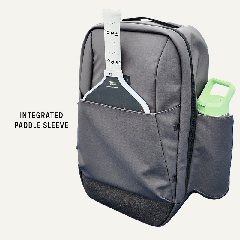 Gray backpack with integrated paddle sleeve and a side pocket for a water bottle.