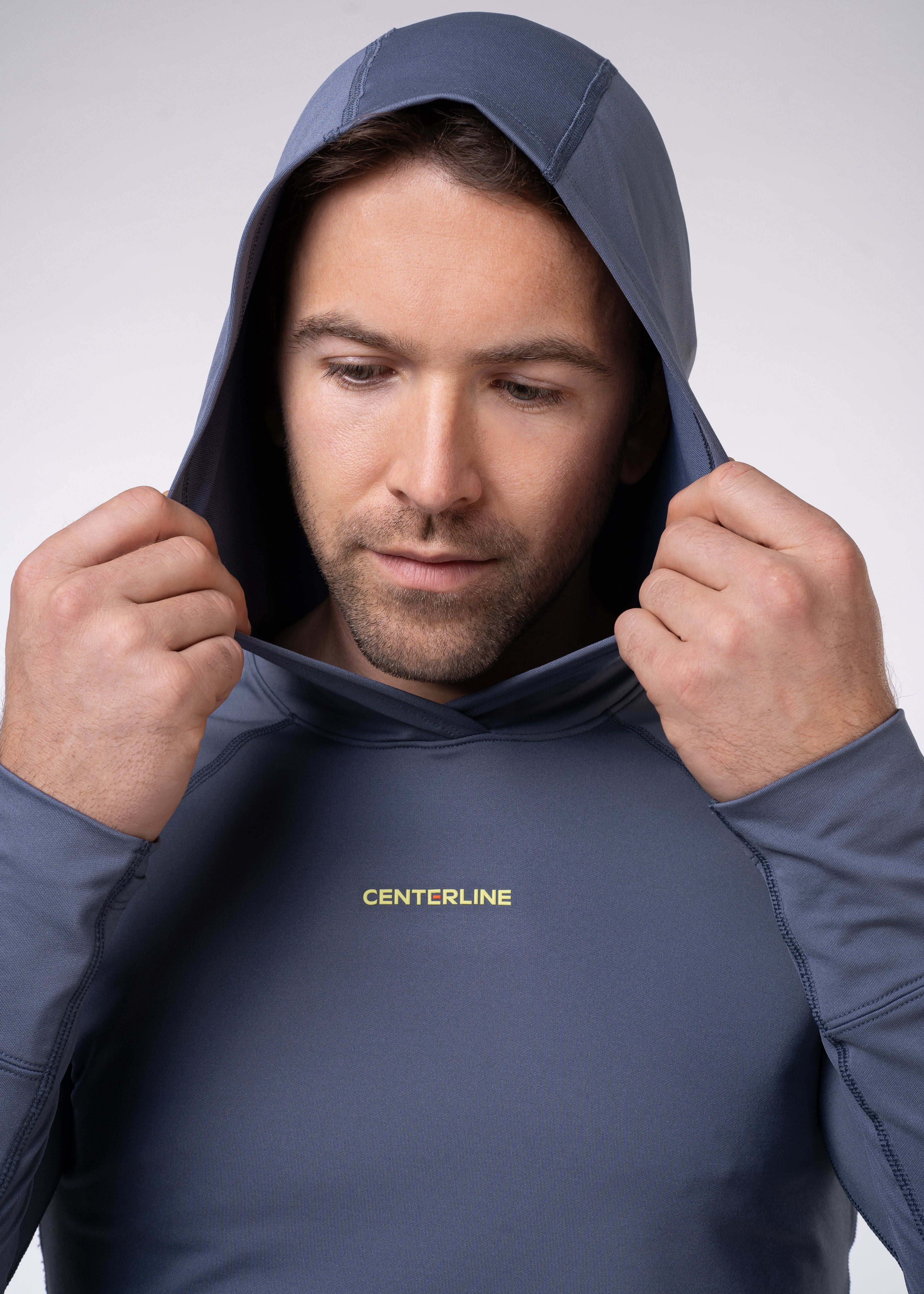 Layering Hoodie Men's - FORWRD  -  Stay cool and comfortable with our performance-enhanced fabric, designed to regulate your temperature on and off the court. The curved hem allows for freedom of movement, while the extended back hem offers added coverage. Keep your sleeves secure with our discreet thumbholes—perfect for those chilly morning warm-ups or brisk climate play. This top is ideal for layering during warm-ups or tackling cooler conditions in style.