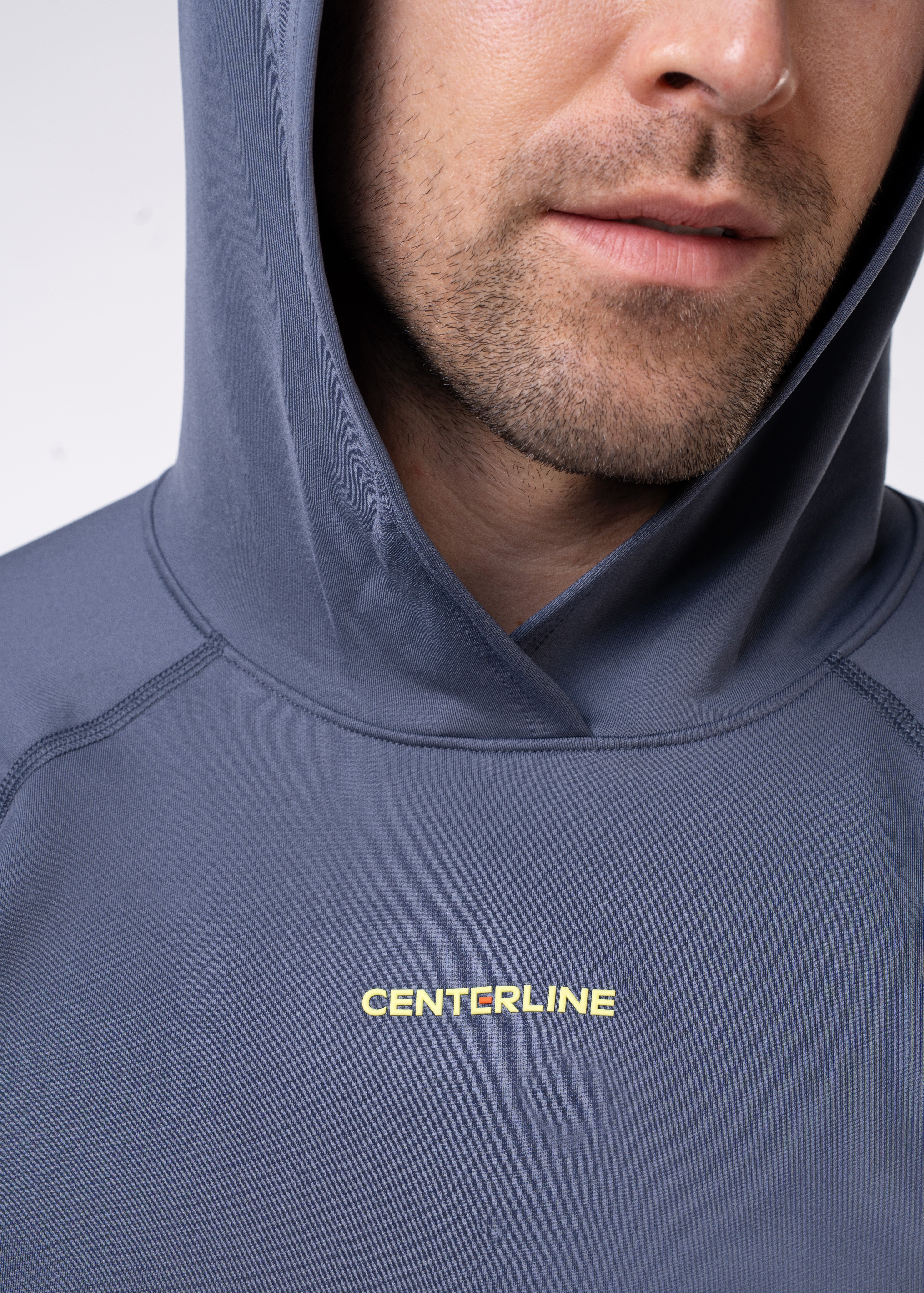 Layering Hoodie Men's - FORWRD  -  Stay cool and comfortable with our performance-enhanced fabric, designed to regulate your temperature on and off the court. The curved hem allows for freedom of movement, while the extended back hem offers added coverage. Keep your sleeves secure with our discreet thumbholes—perfect for those chilly morning warm-ups or brisk climate play. This top is ideal for layering during warm-ups or tackling cooler conditions in style.