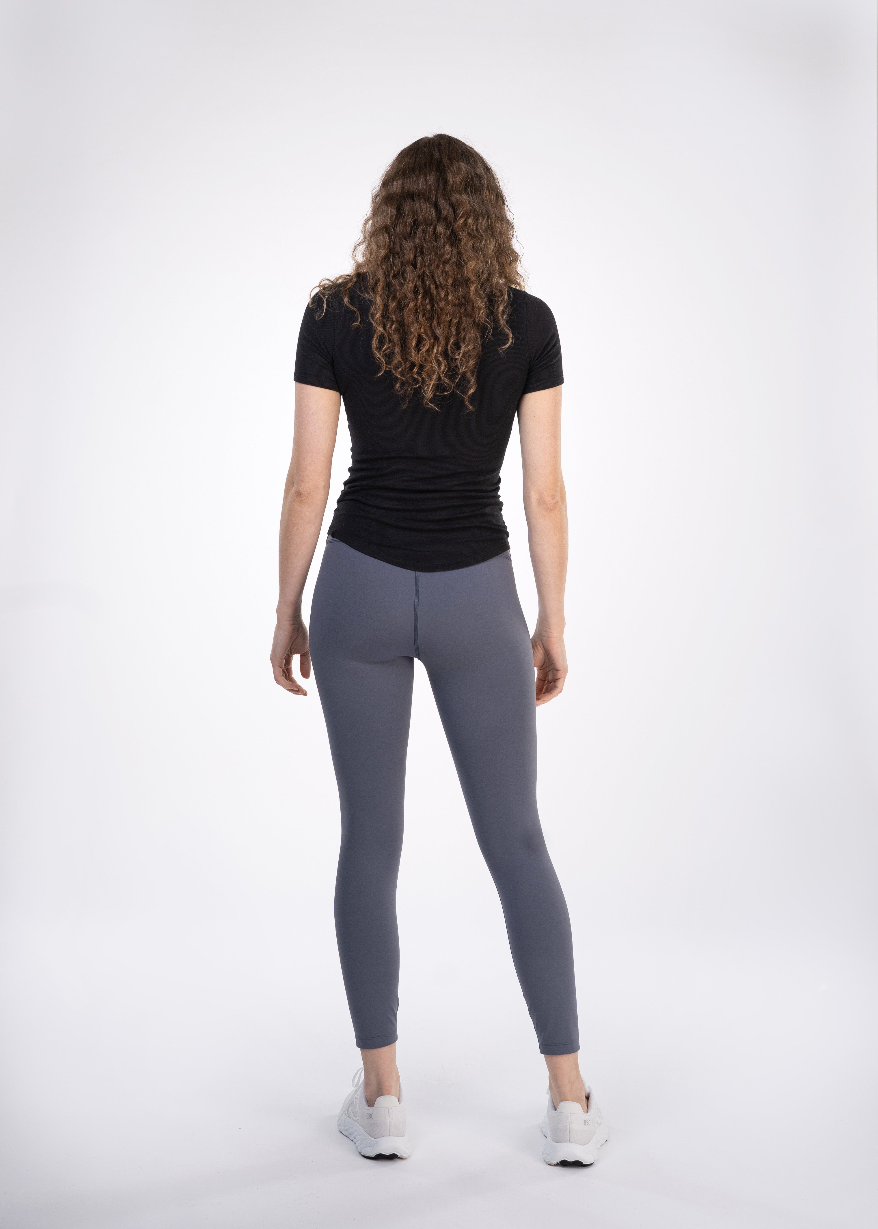 Rise ‘n Rally 7/8 Legging - FORWRD  -  Designed for comfort and performance, these ultra high-rise leggings offer soft, stretchy support through the midsection. The front waistband is smooth and comfortable, while the back features a drop-in pocket for your essentials. With no front rise seam, you’ll stay comfortable and free from any awkward fit issues. Perfect for pickleball and beyond!