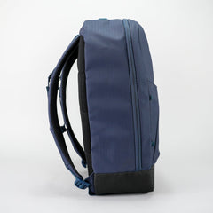Navy blue backpack on a white background